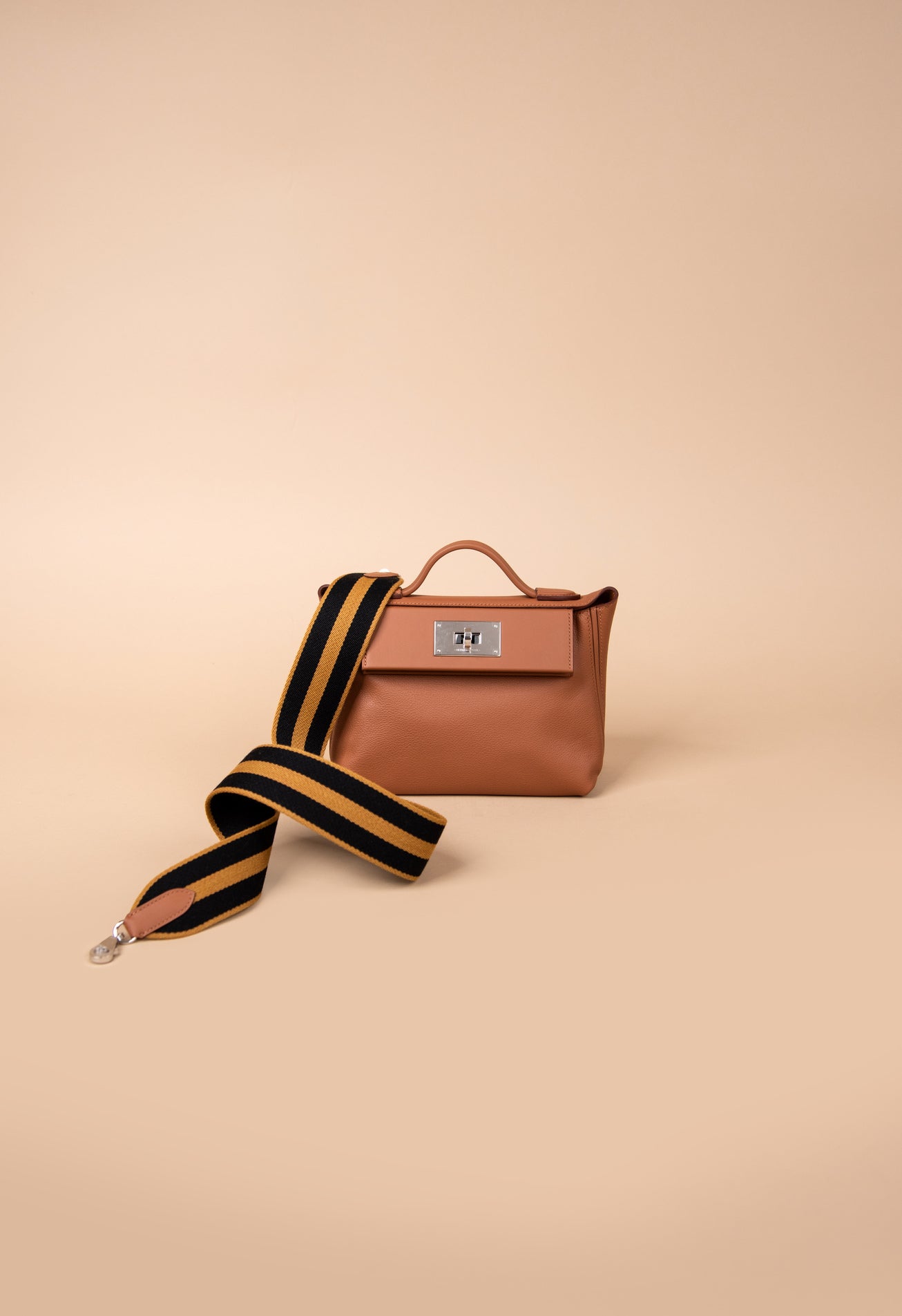 Hermès Mini 24/24 in Gold PHW