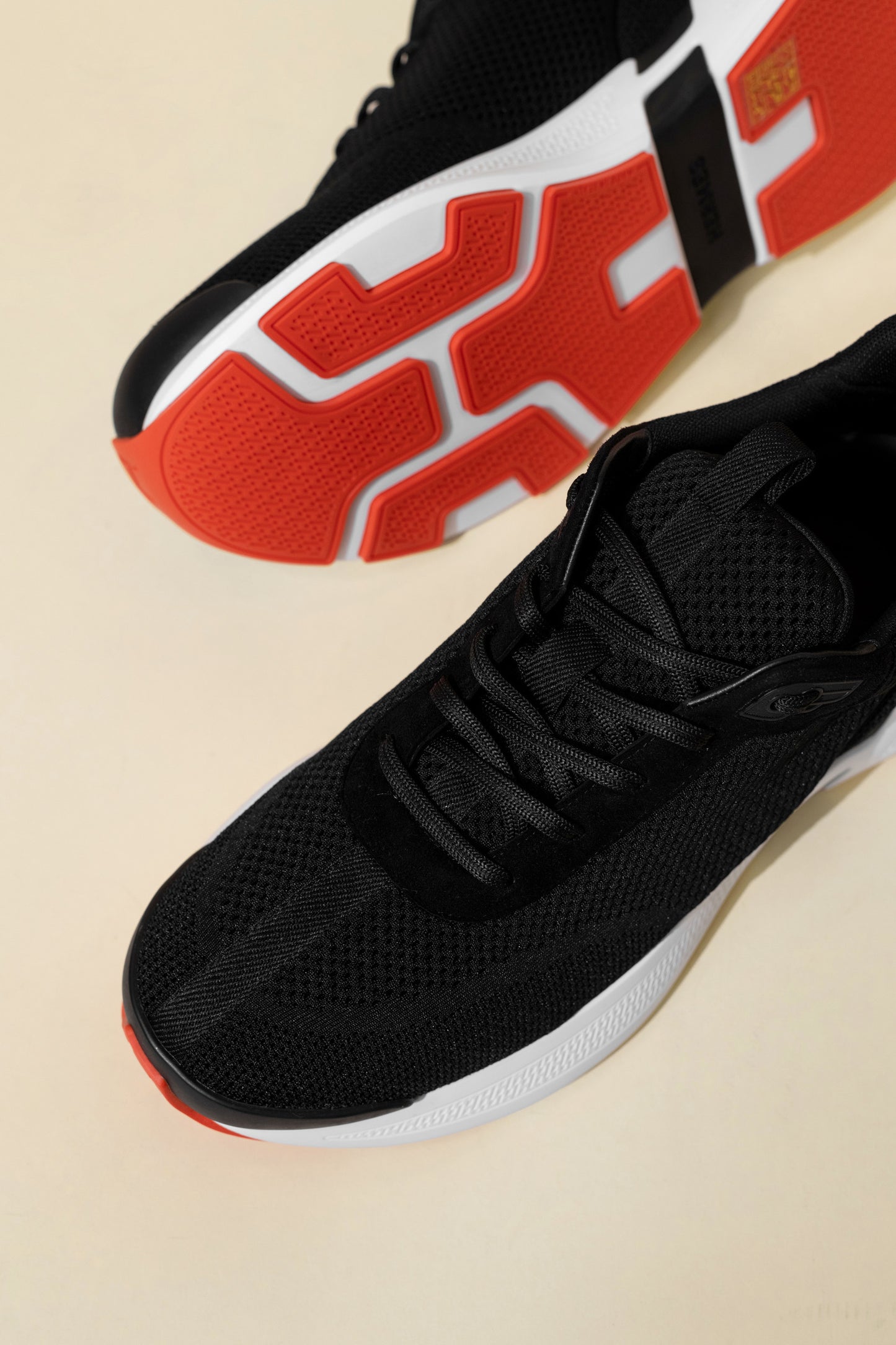 Hermès Heros Sneakers in Black/White/Orange