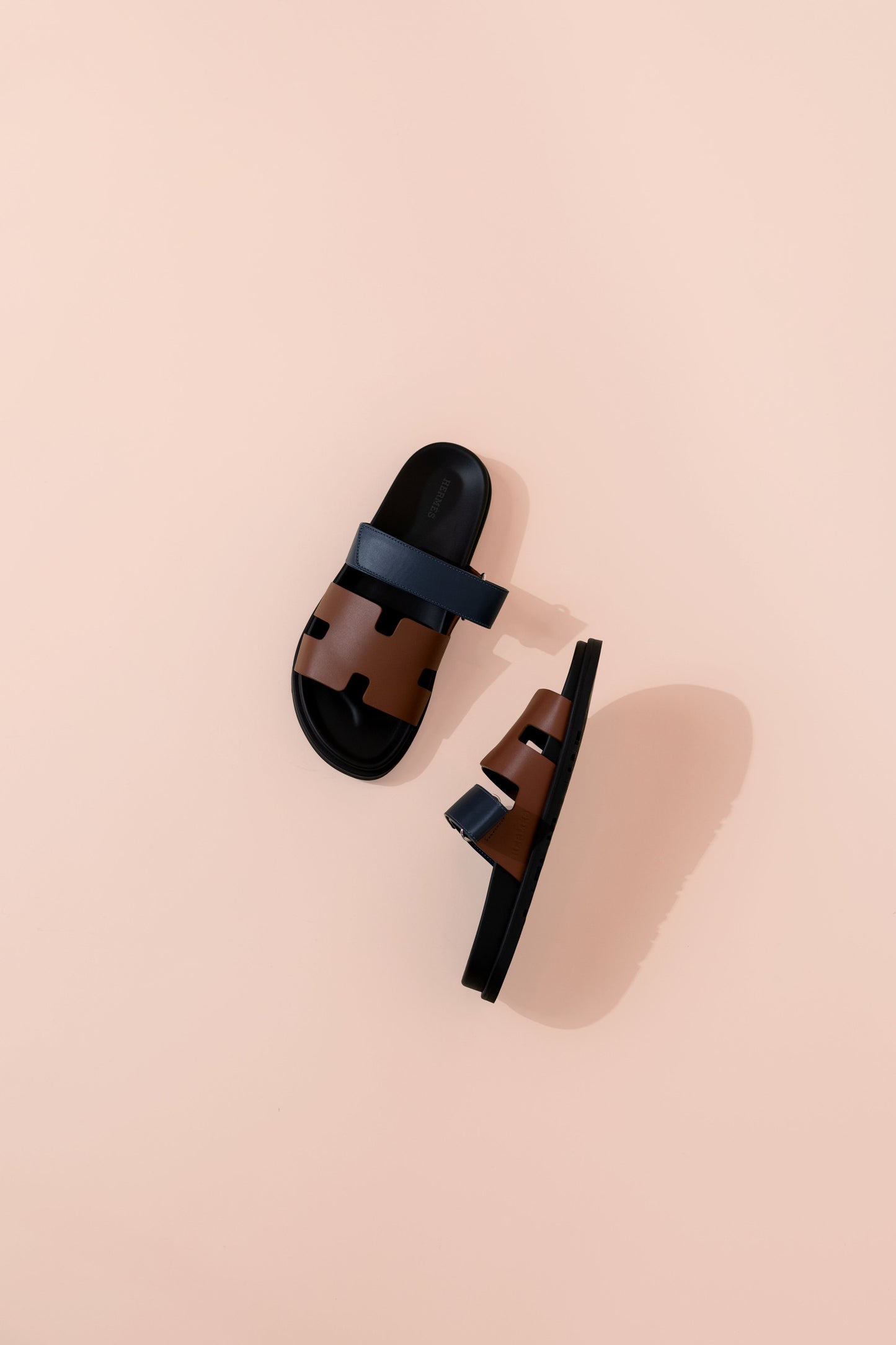 Hermès Chypre Sandals in Gold/Navy