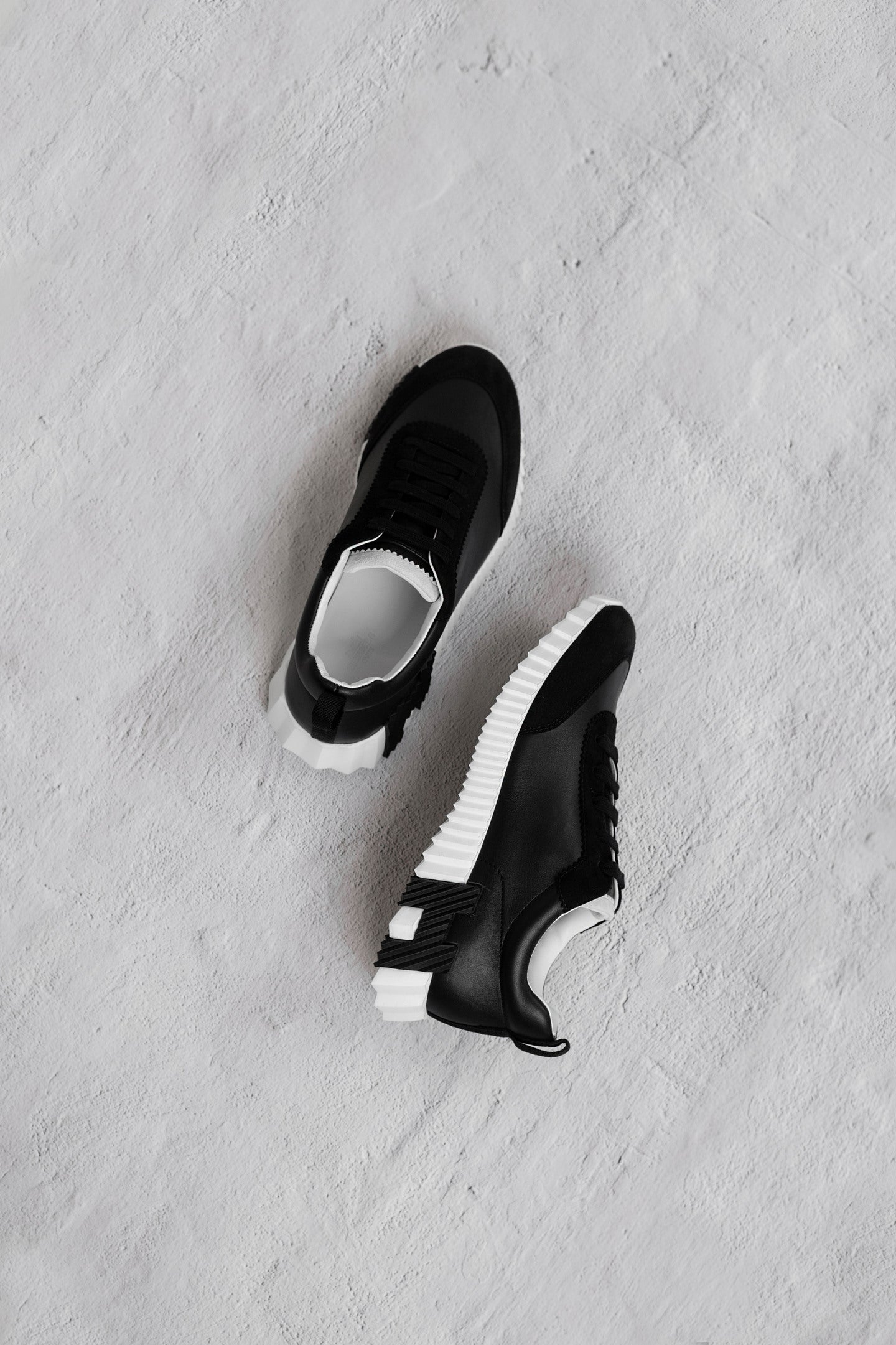 Hermès Bouncing Sneakers in Black/White