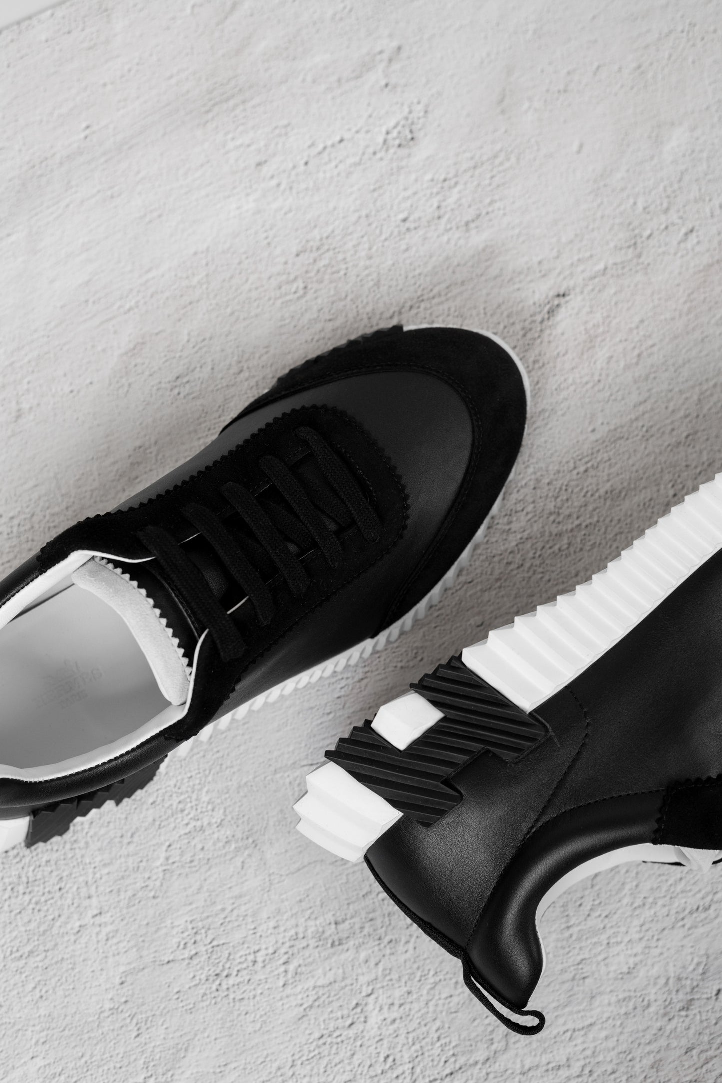 Hermès Bouncing Sneakers in Black/White