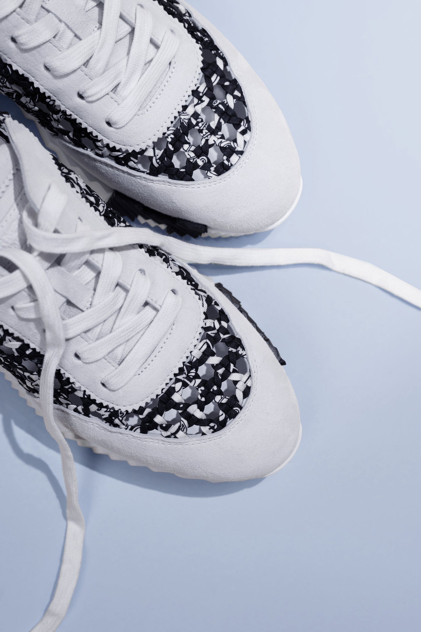 Hermès Bouncing Sneakers in Noir/Blanc