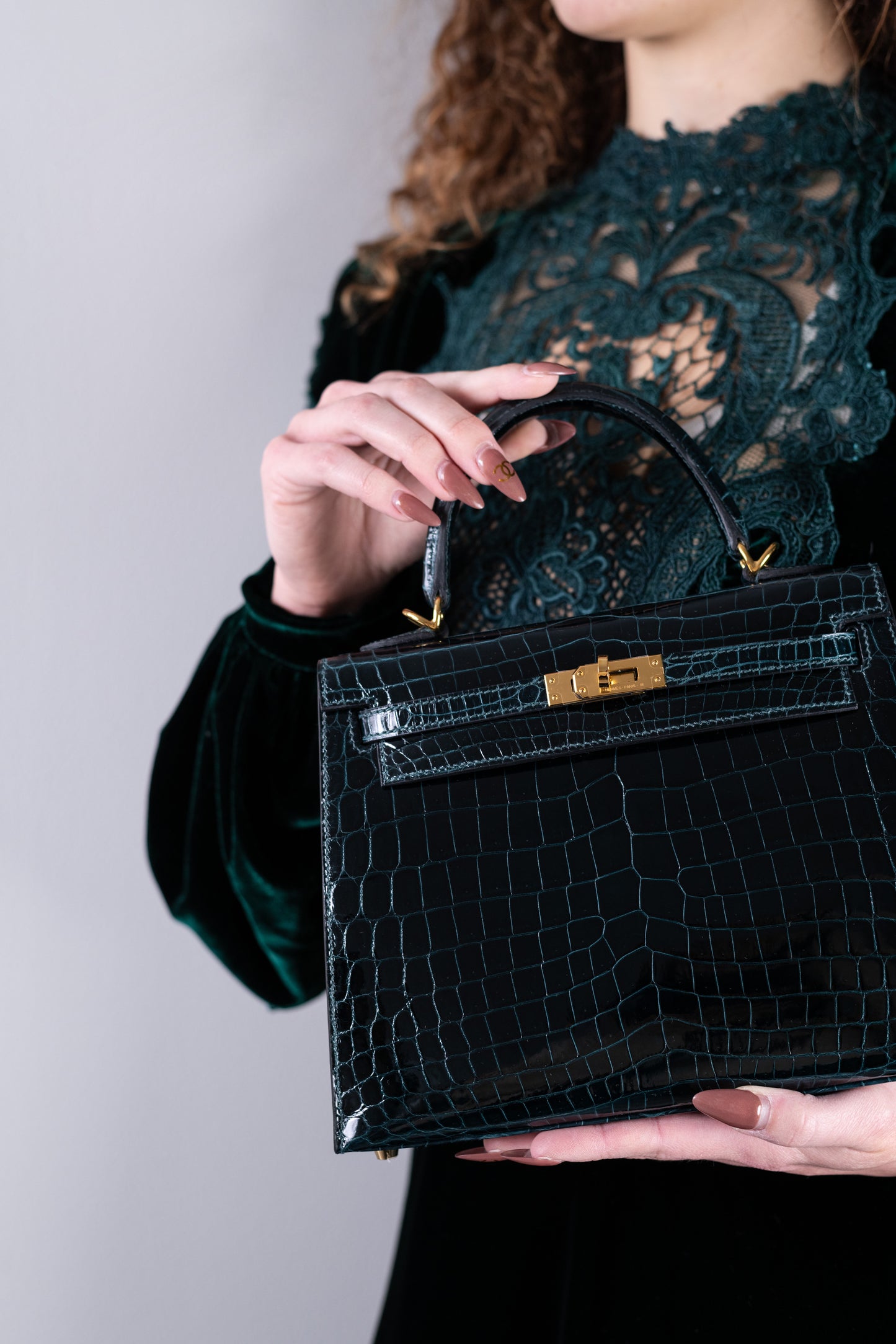 Hermès Kelly 25 Shiny Crocodile Vert Cypress with Costarellos Dark Green Velvet Gown