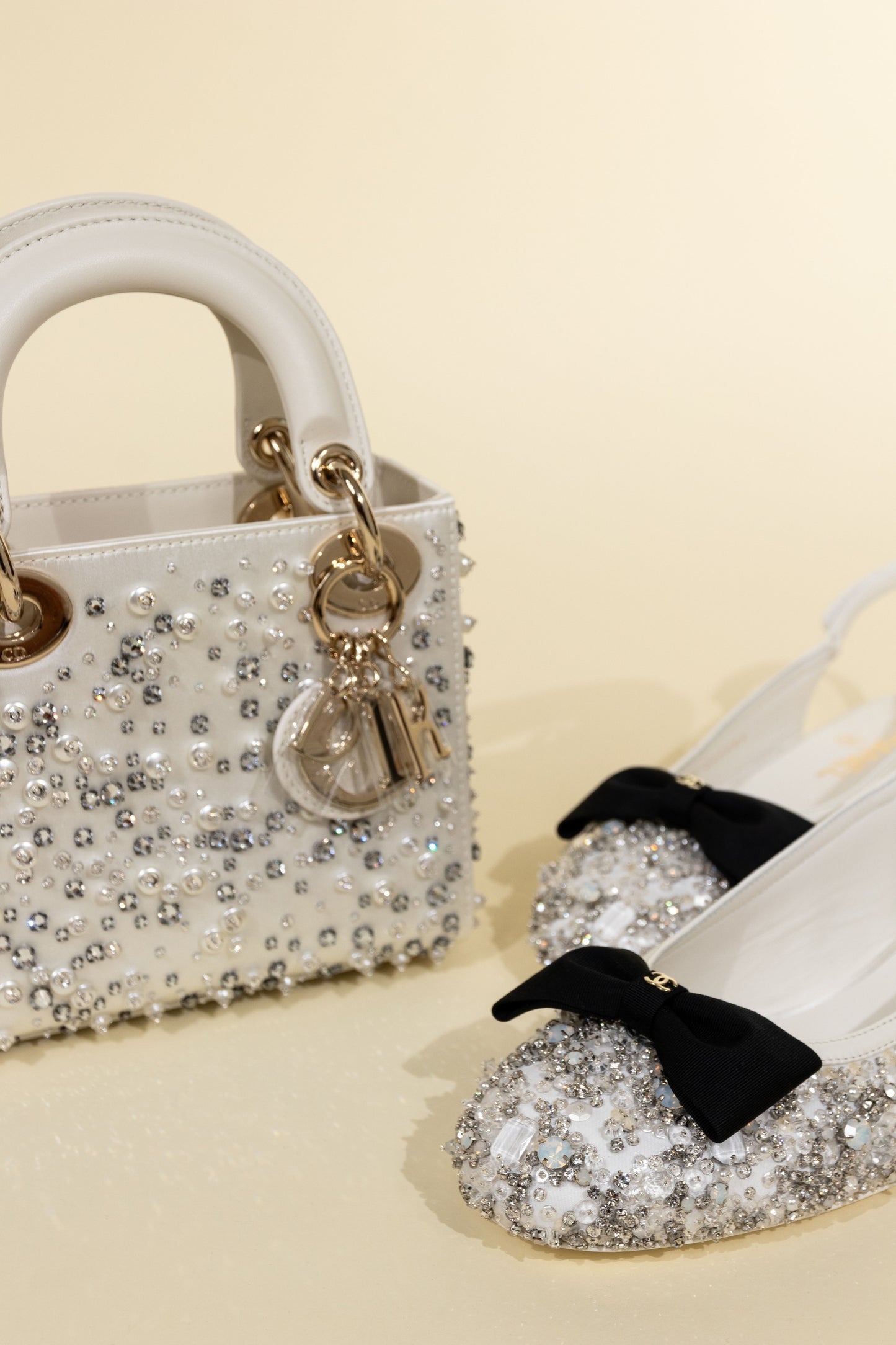 Dior Mini Lady Dior Bag in Latte Satin Embroidered with Beads & Chanel White/Black Bow Beaded Flats