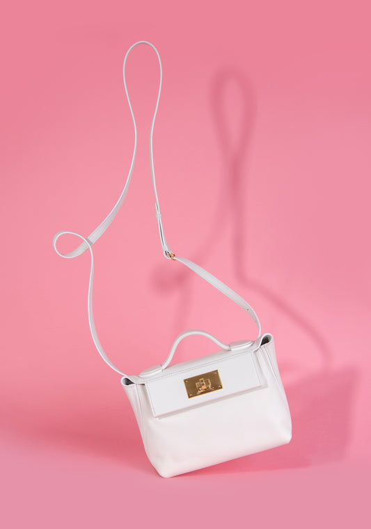 Hermès - فستان Mini 24/24 باللون الأبيض GHW وفستان Zimmermann Sunray متوسط الطول