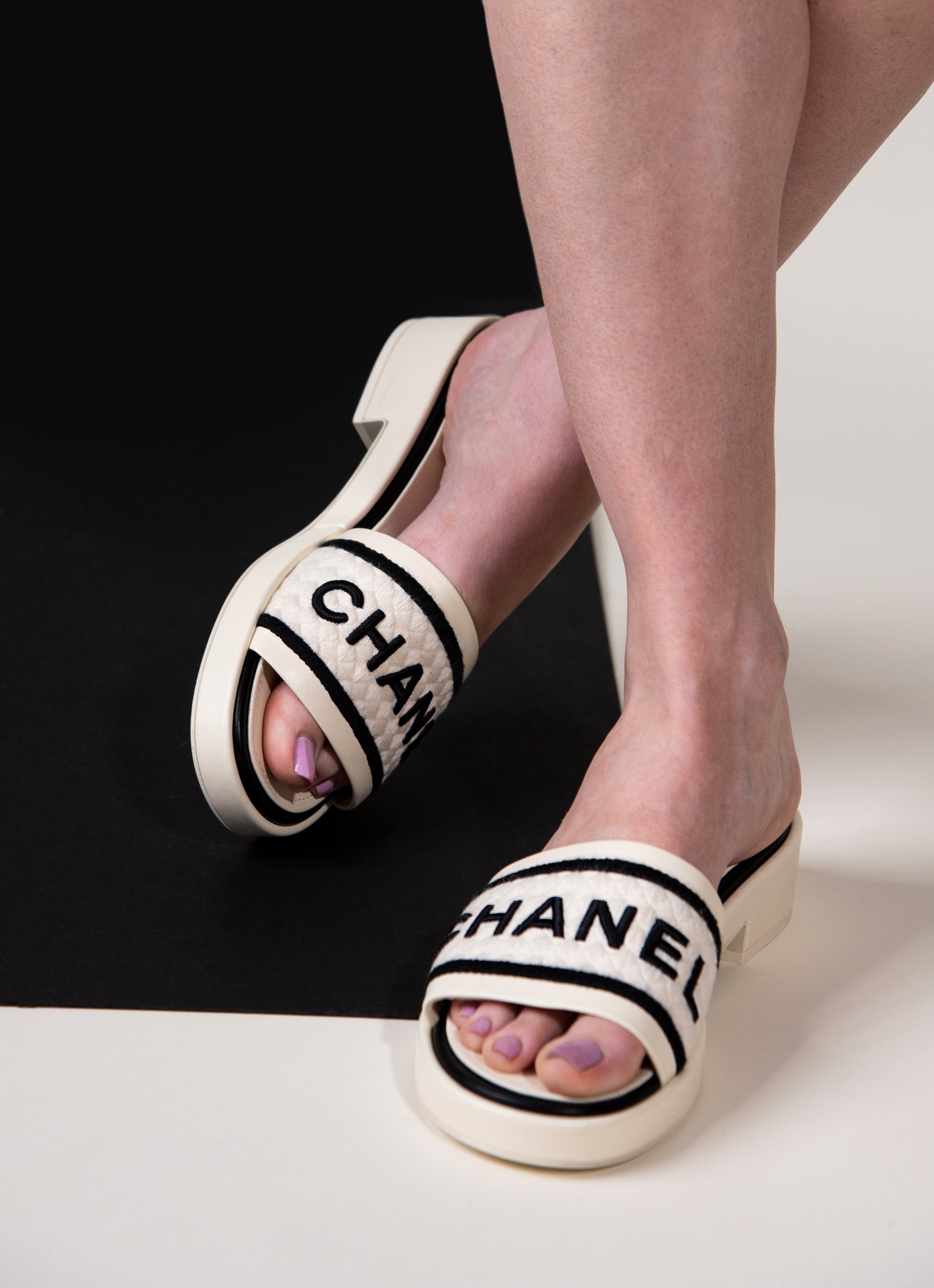 Chanel Mules in Ivory/Black