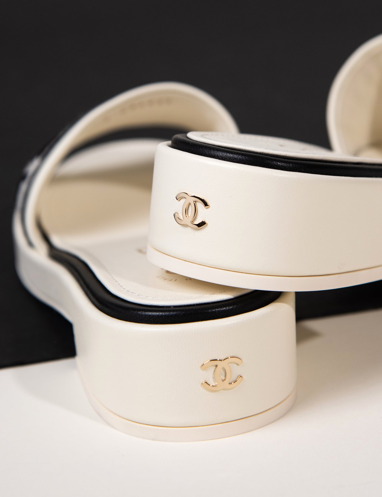 Chanel Mules in Ivory/Black