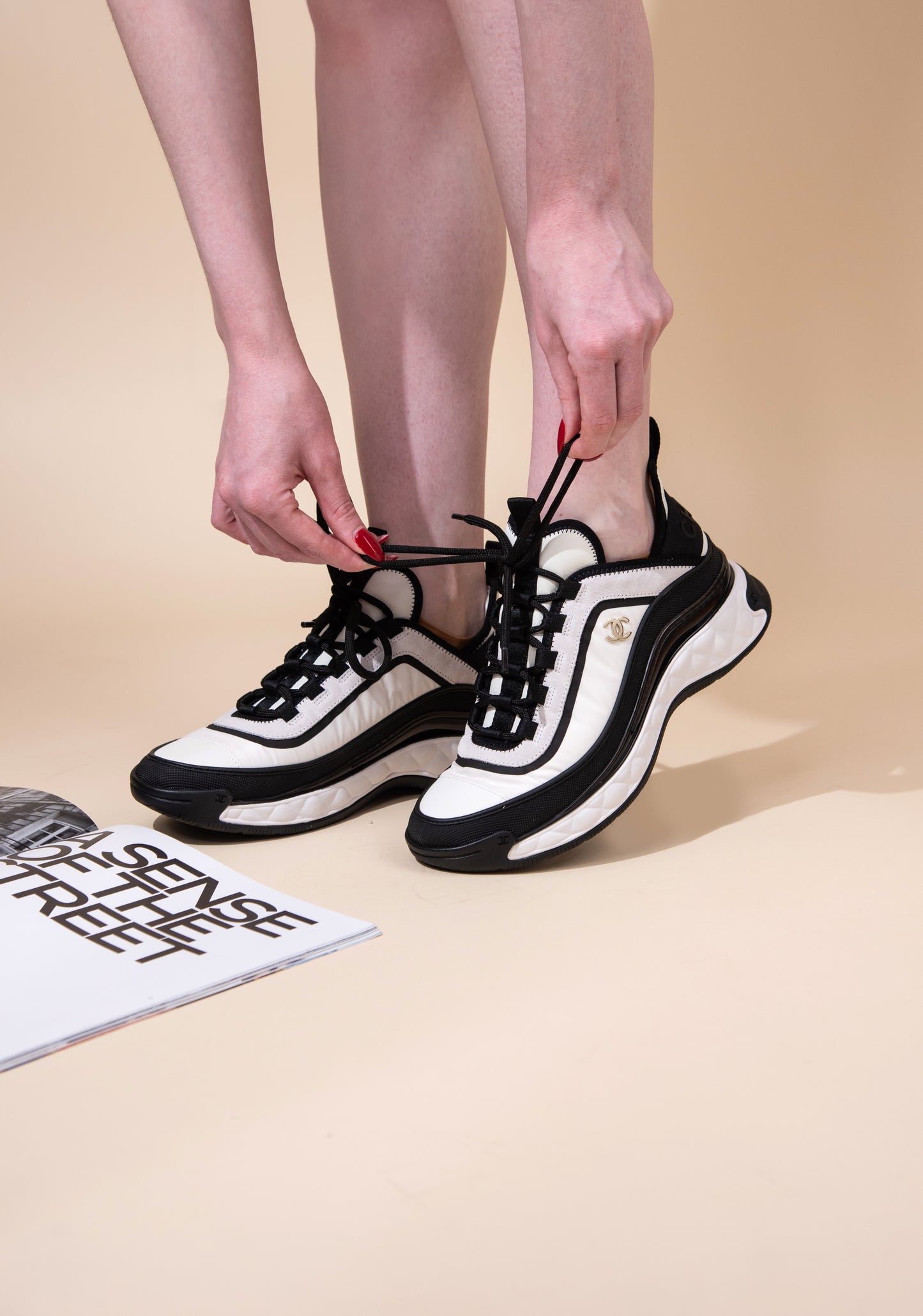 Chanel CC Logo Sneakers in Black/White