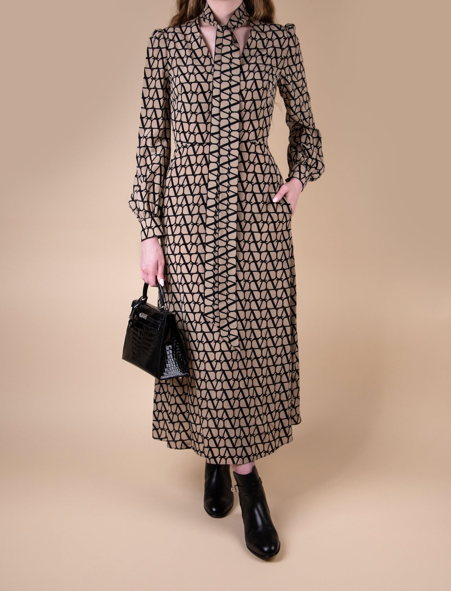 Hermès Kelly 25 Black Shiny Crocodile PHW with Valentino Crepe de Chine Logo Midi Dress