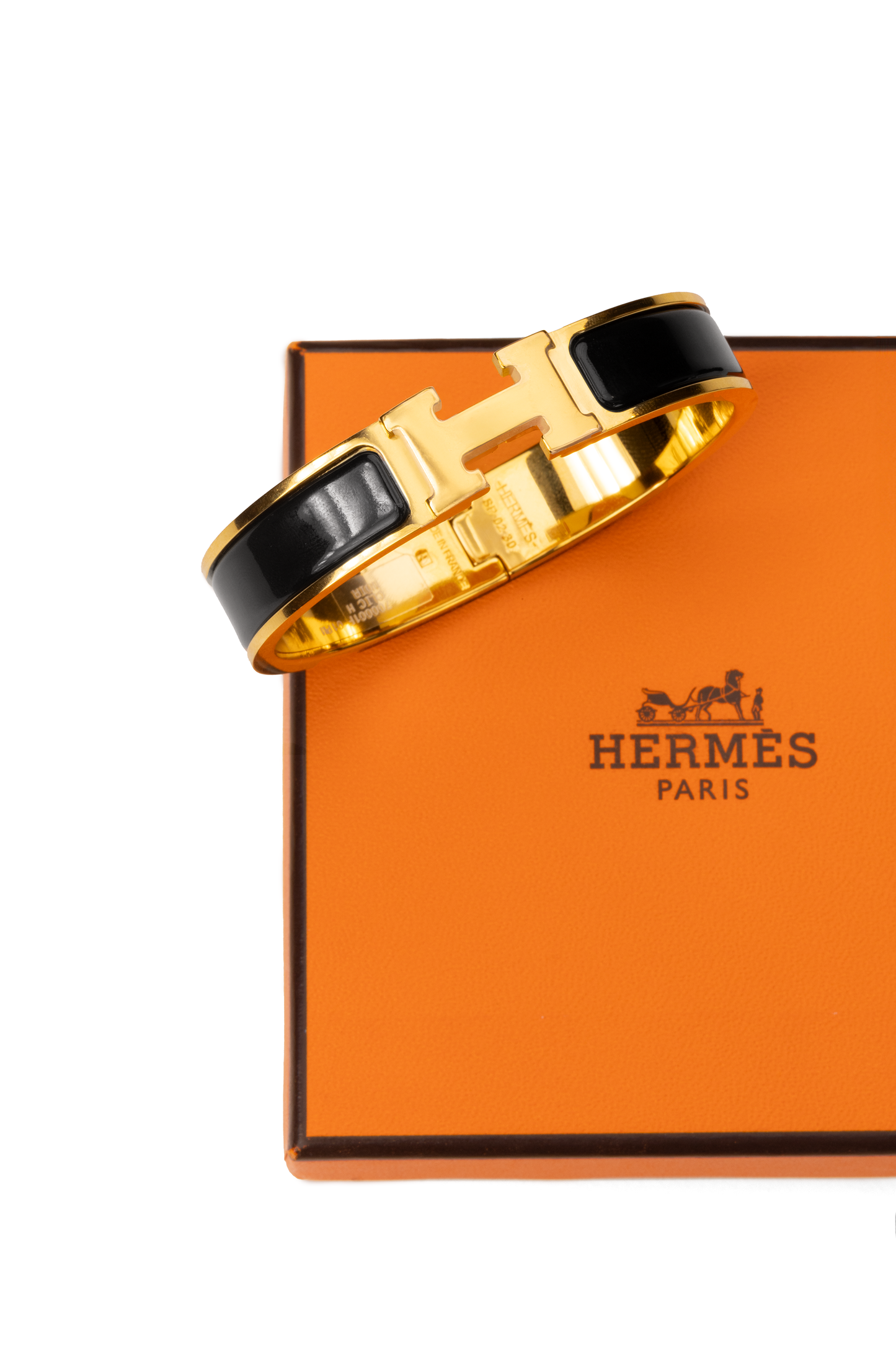 Hermes Clic H Bracelet in Black/Yellow Gold