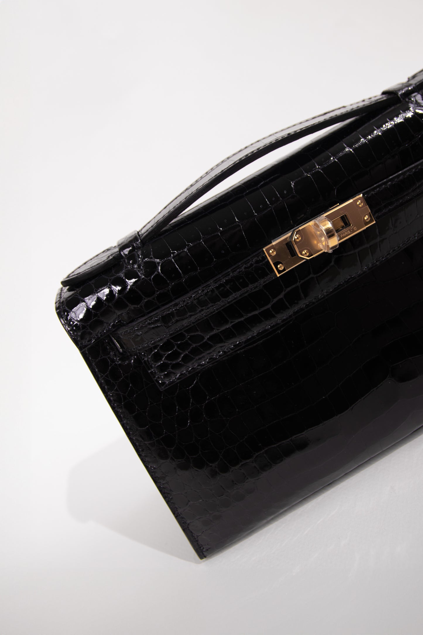 Hermès Kelly Pochette Shiny Alligator Black Ghw