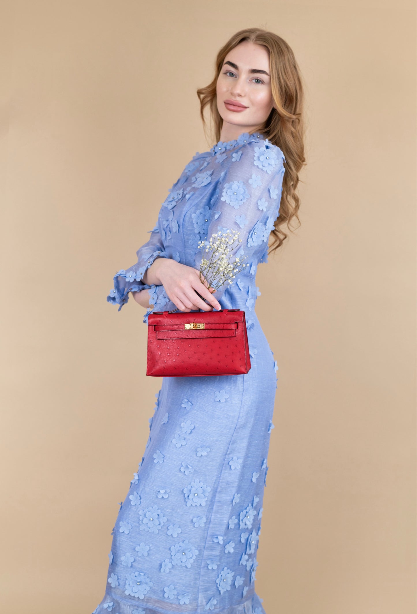 Hermès Kelly Pochette Ostrich in Rouge Vif GHW