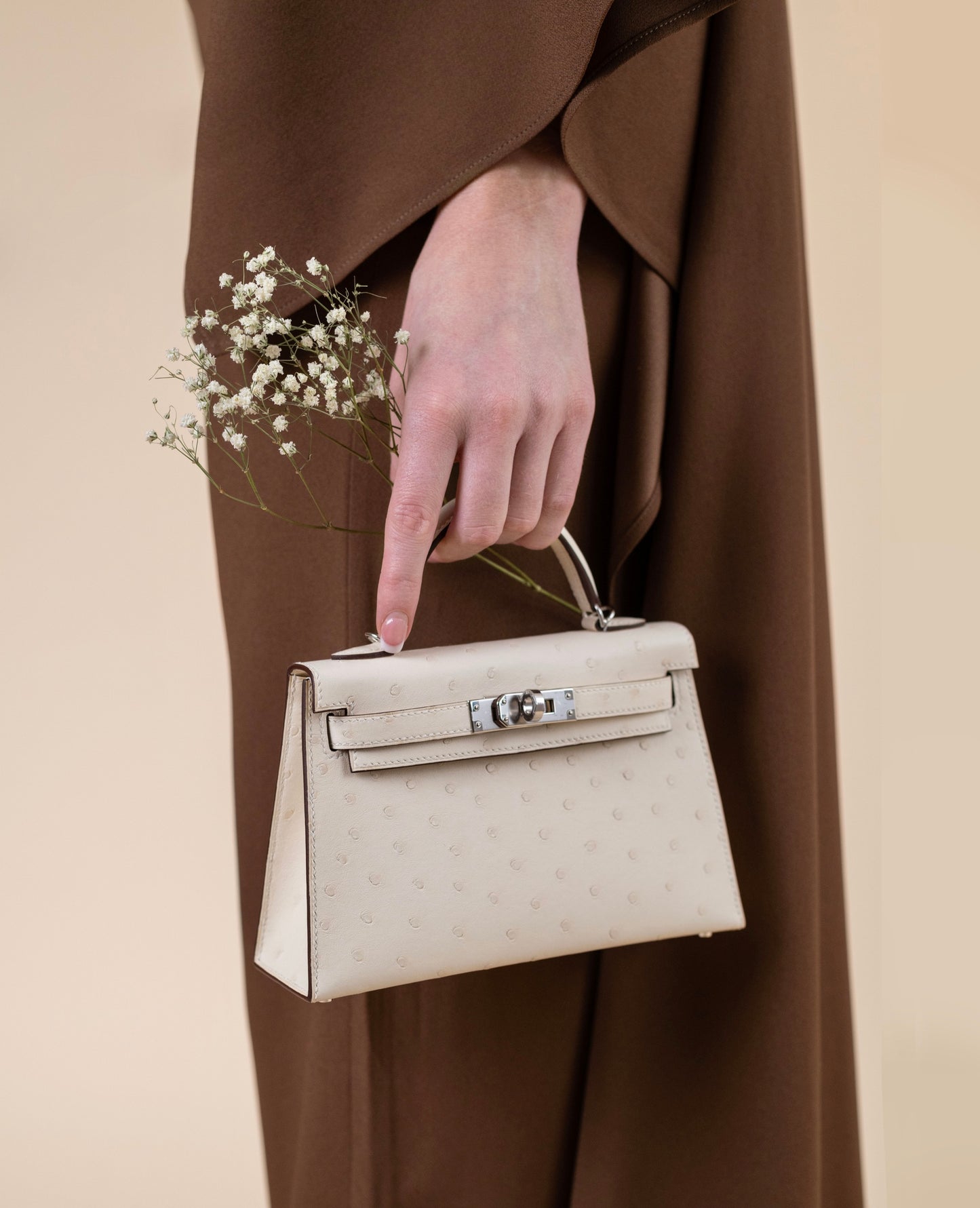 Hermès Mini Kelly 20 in Ostrich Nata PHW