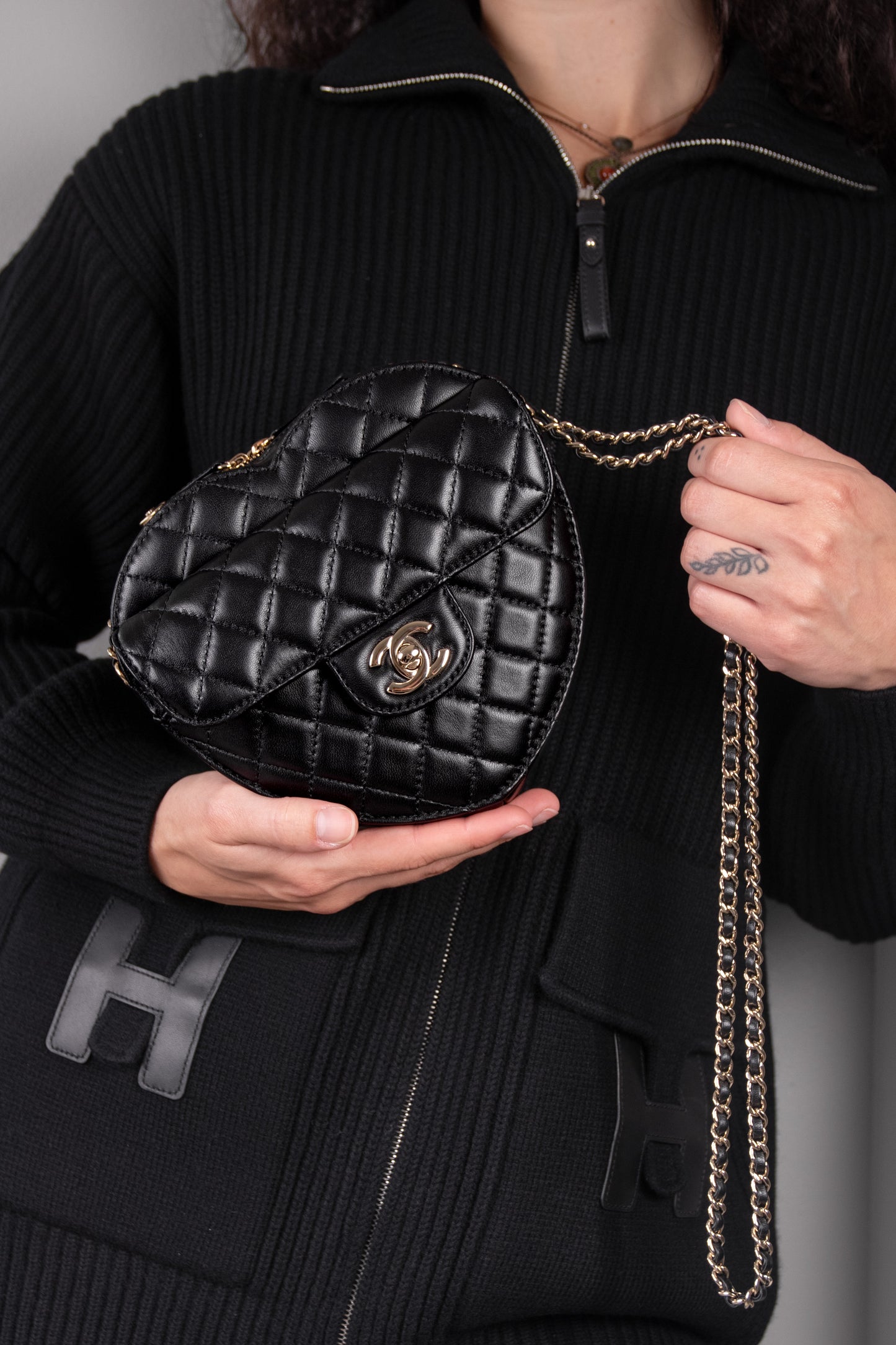 Hermès Wool Knit Black Jacket & Chanel Black Heart Bag