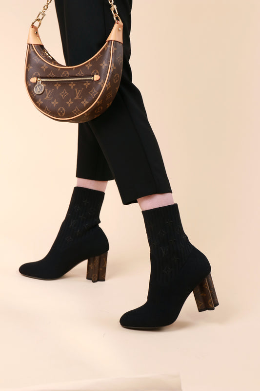 حذاء الكاحل من لويس فيتون بتصميم سيلويت مع حقيبة بحلقة مونوغرام