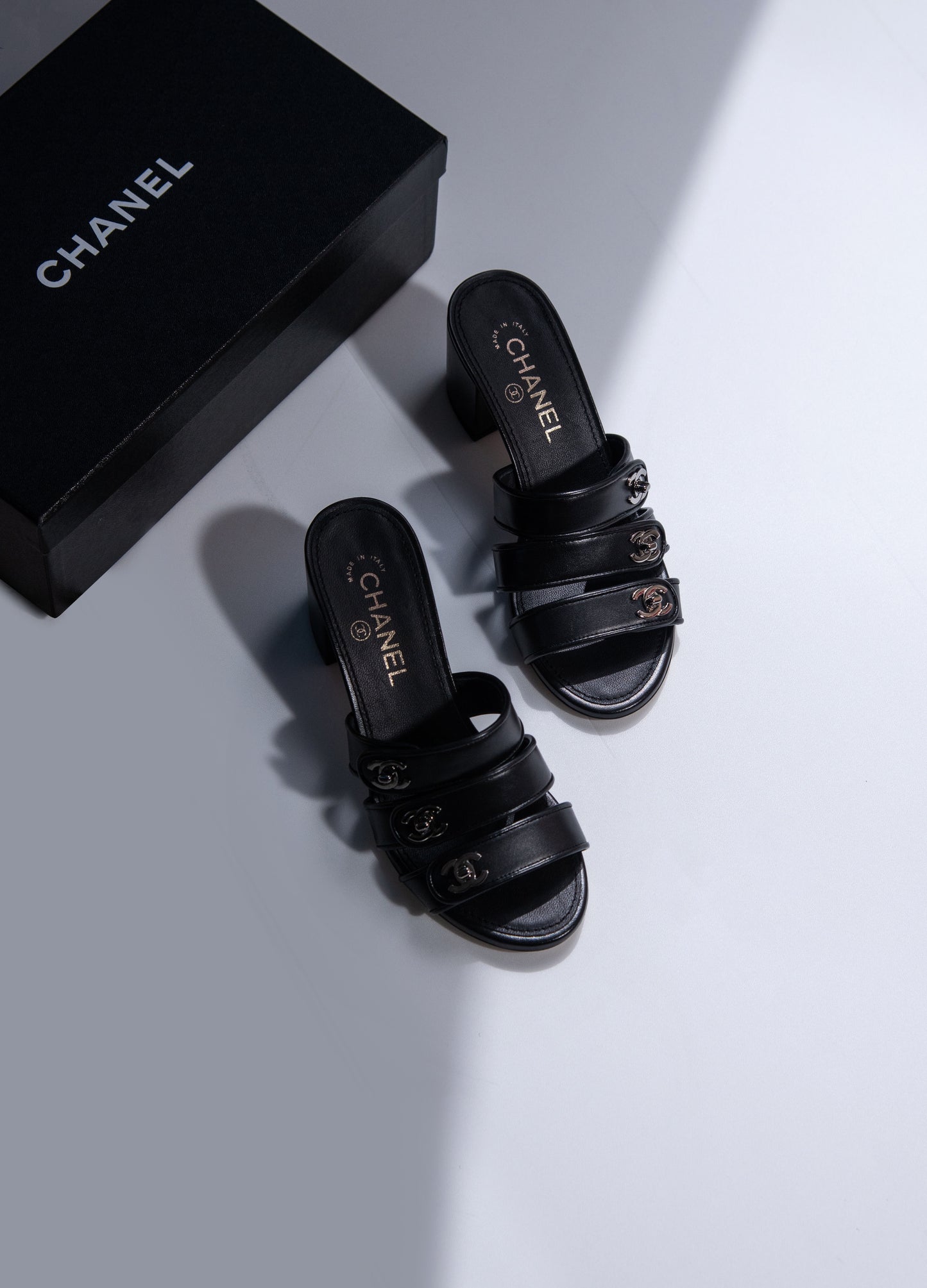 Chanel CC Logo Lock Sandals in Black