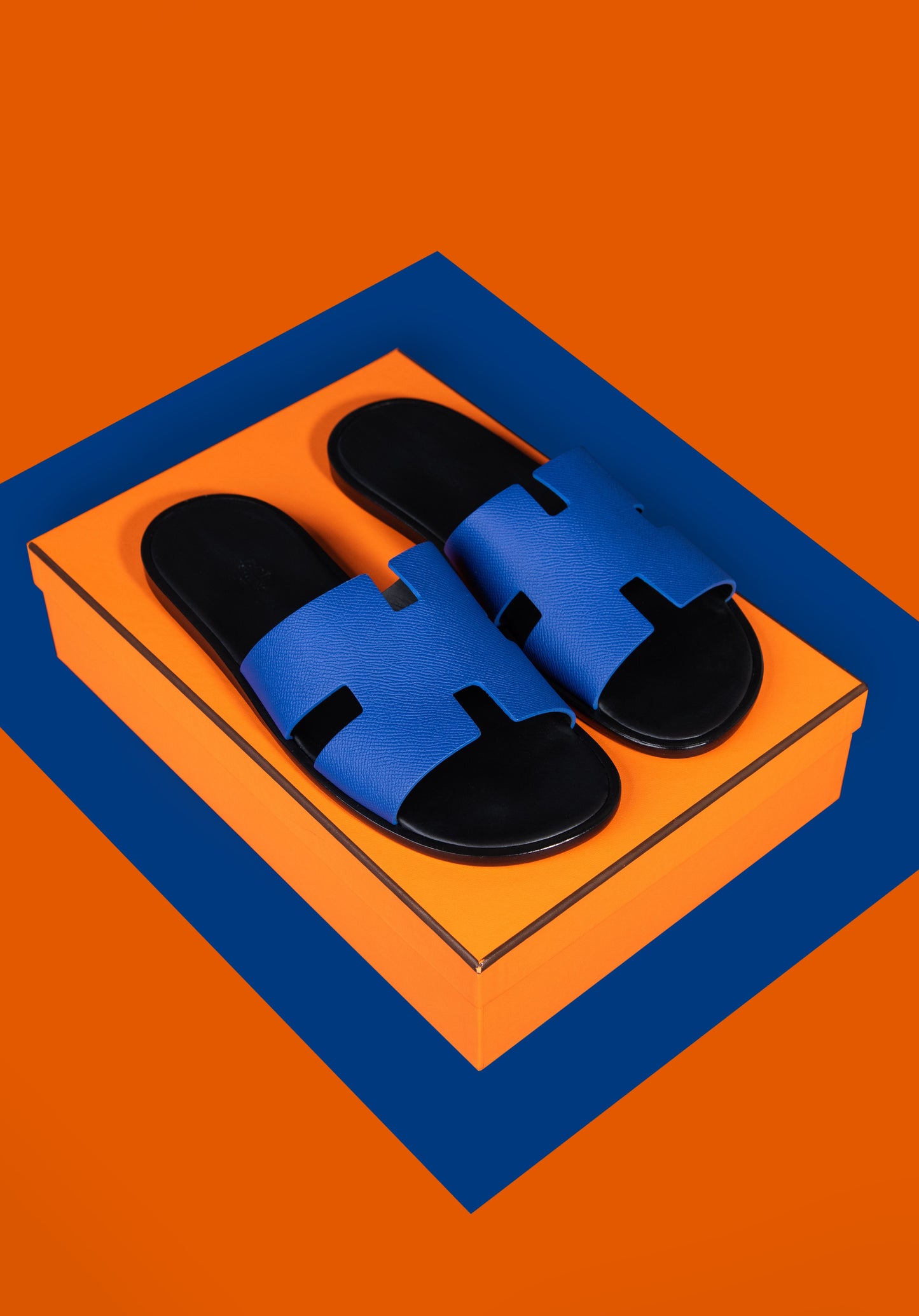 Hermès Izmir Sandals in Blue/Black