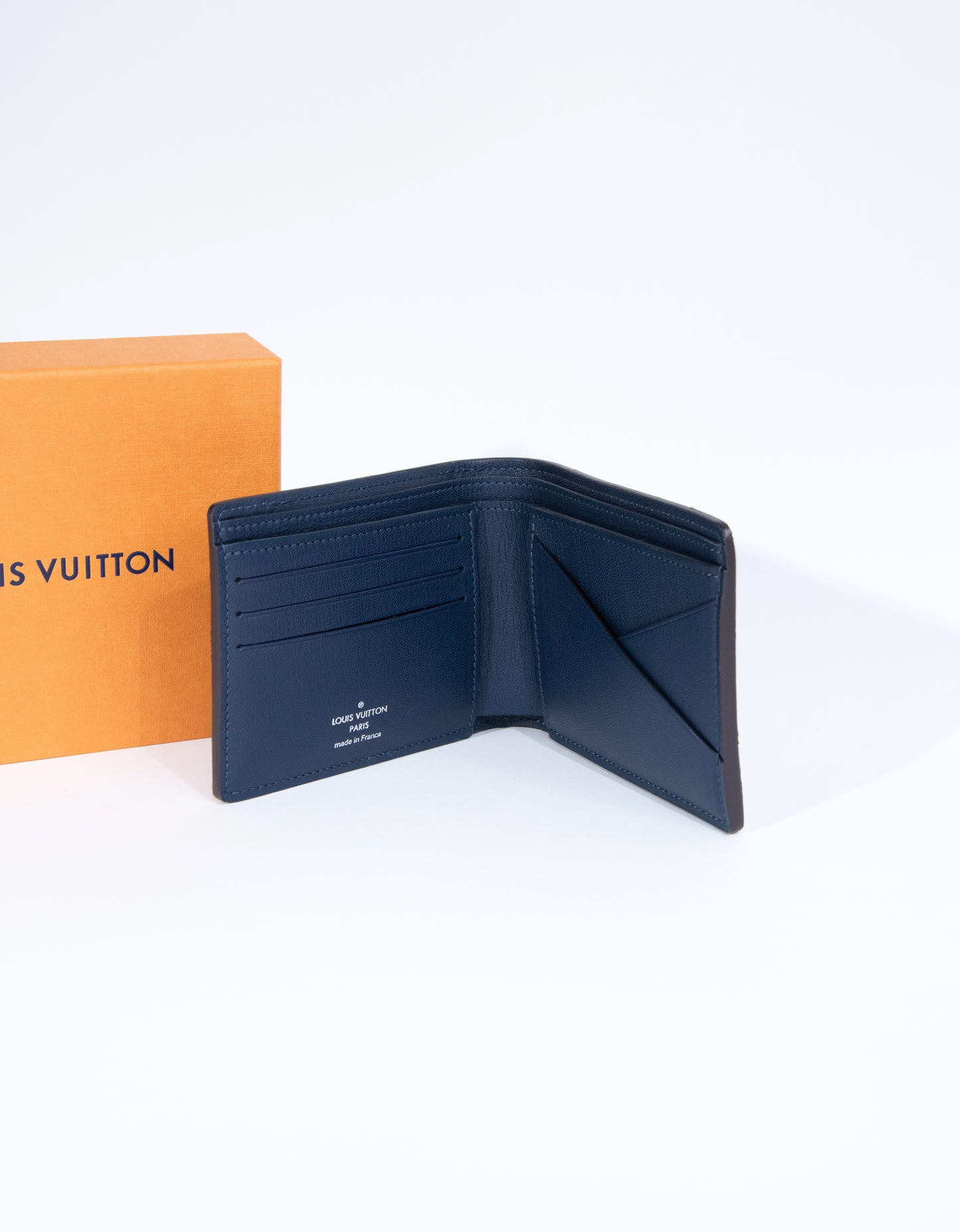 Louis Vuitton Ostrich Multiple Wallet in Blue