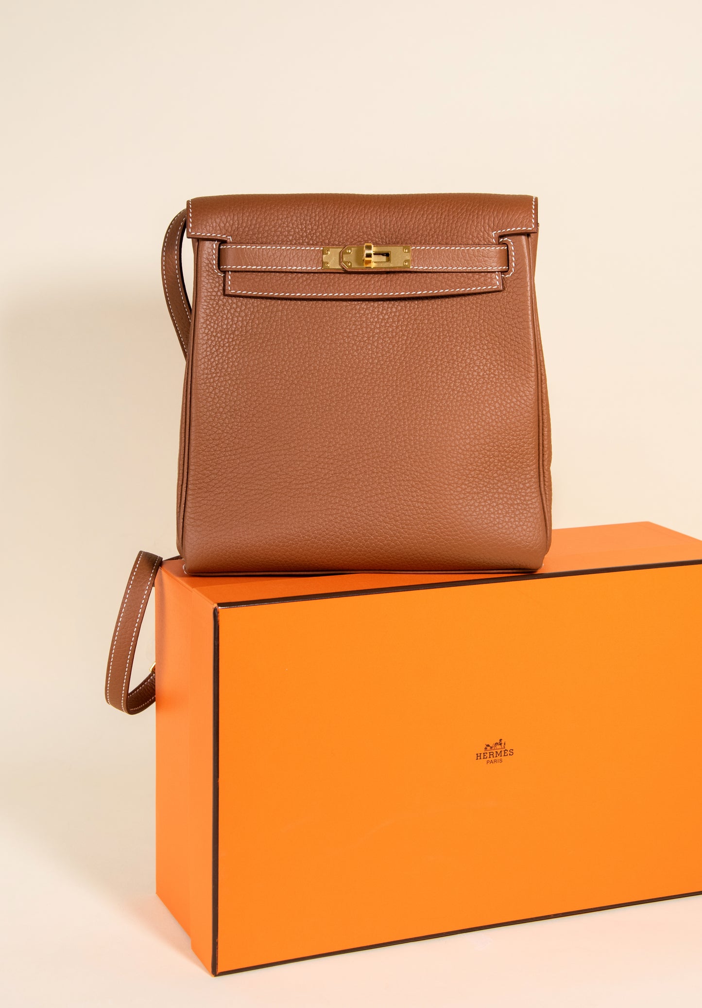 Hermès - Taurillon Clemence Kelly Ado Backpack in Gold GHW