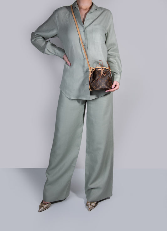 Loro Piana Top & Pants Set with Louis Vuitton Mini Monogram Bucket Bag