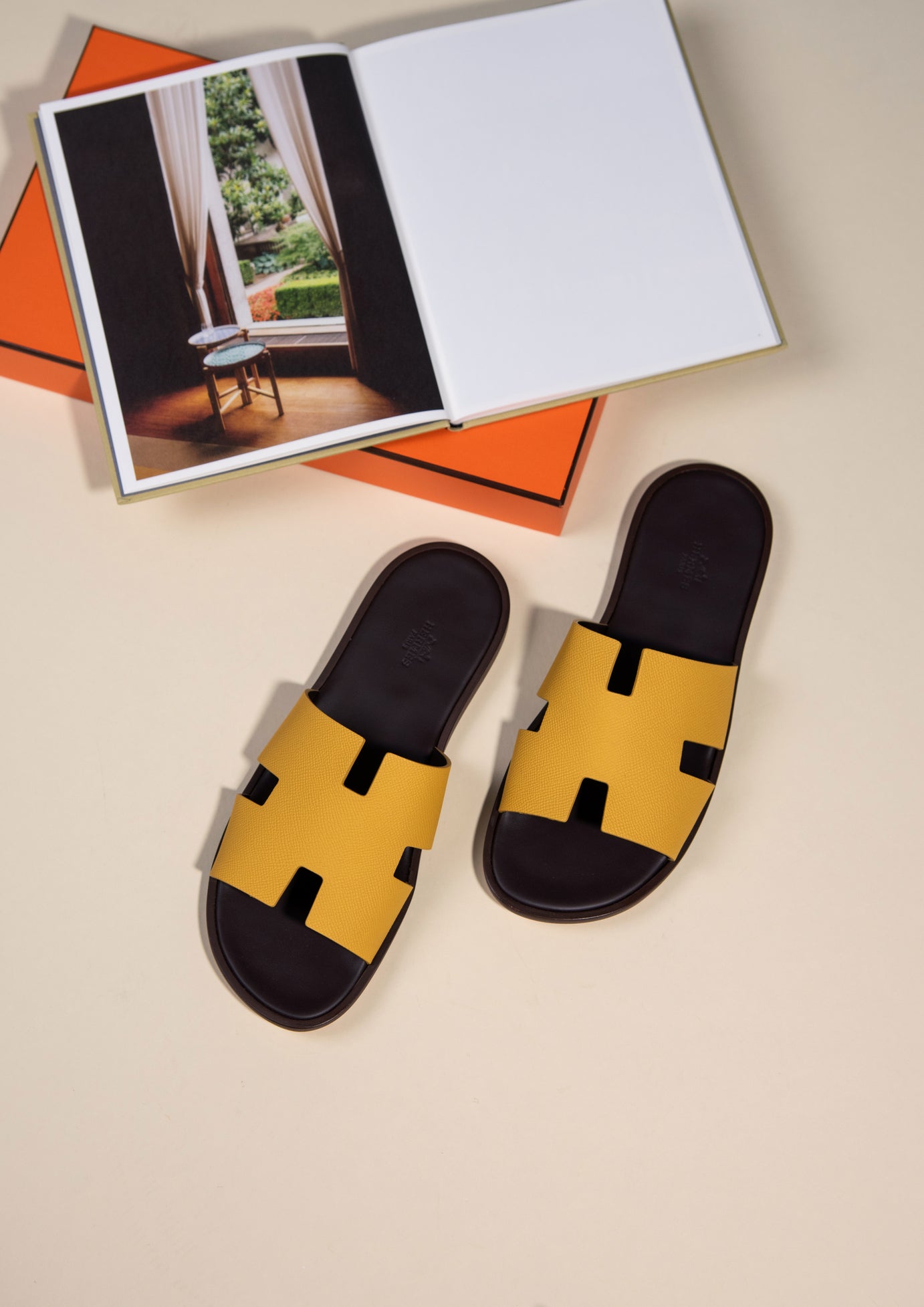 Hermès - Izmir Sandals in Jaune Ambre