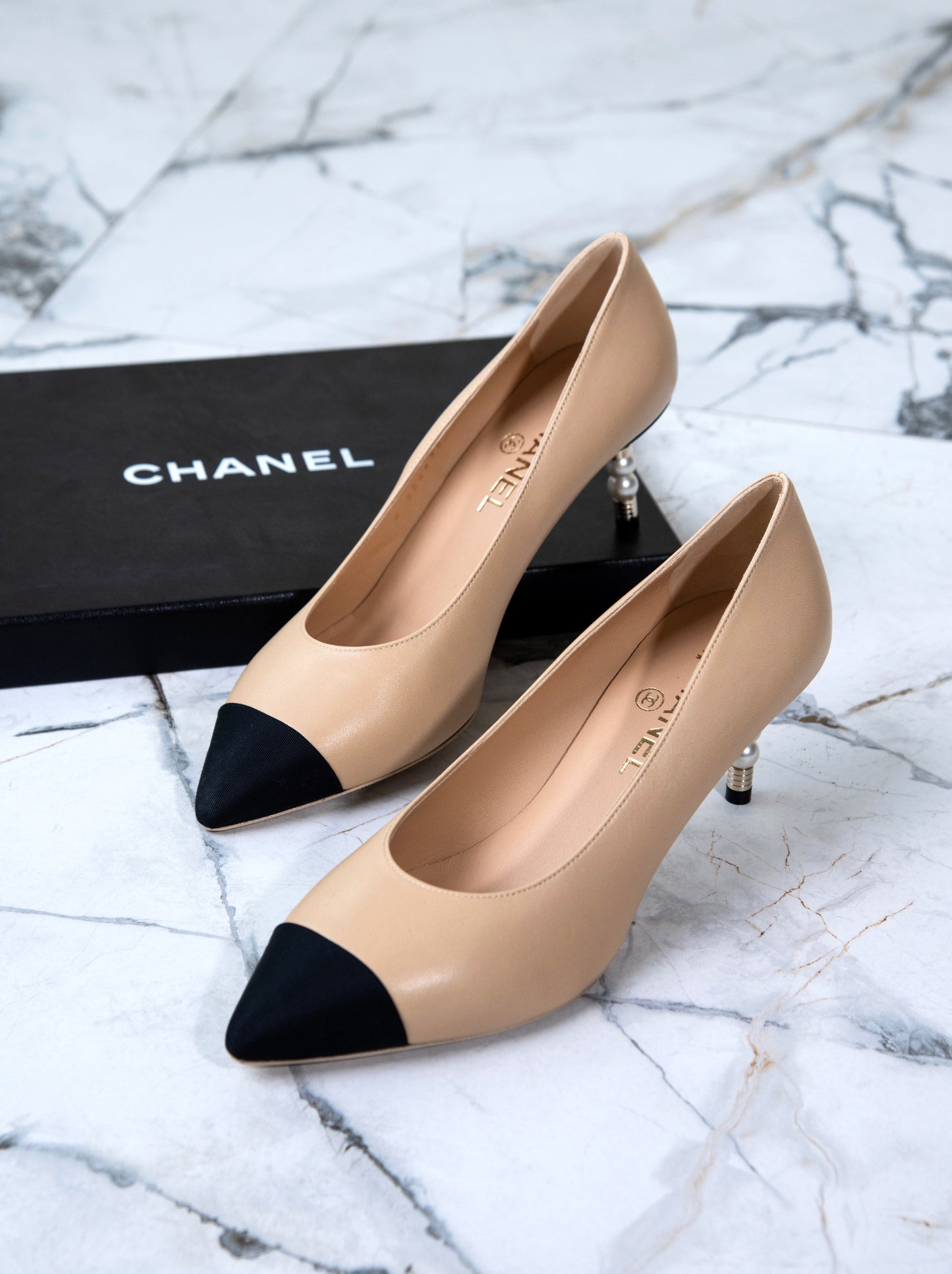 Chanel CC Logo Pearl Heeled Pumps in Beige/Black