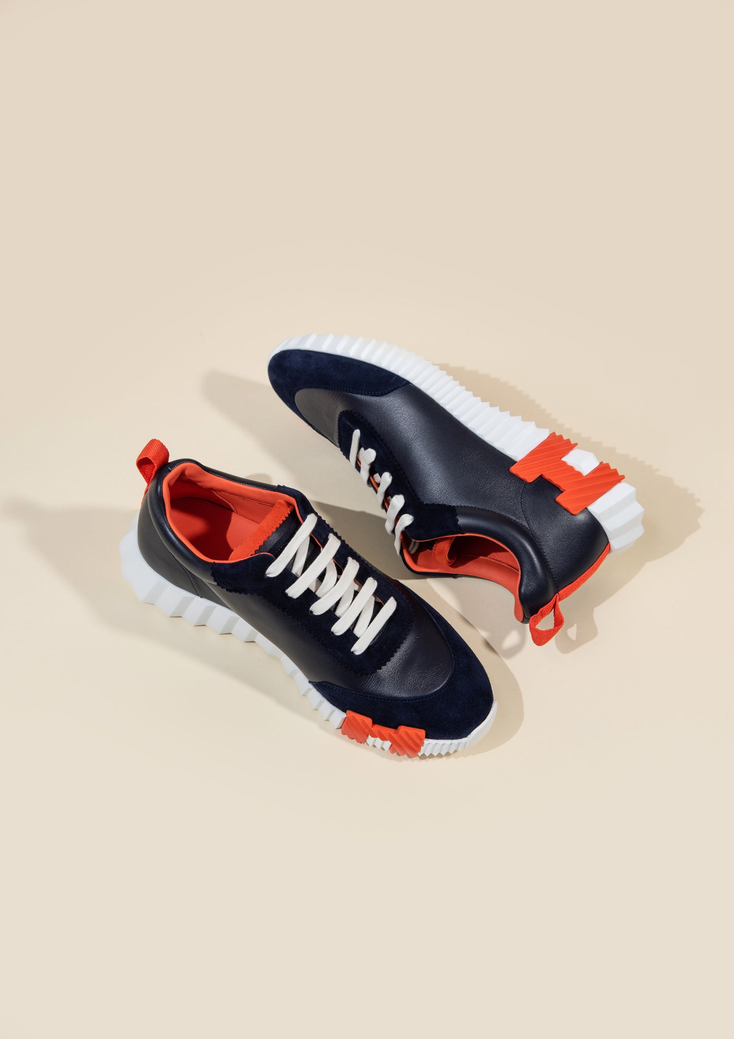 Hermès - Bouncing Sneakers in Marine / Orange H