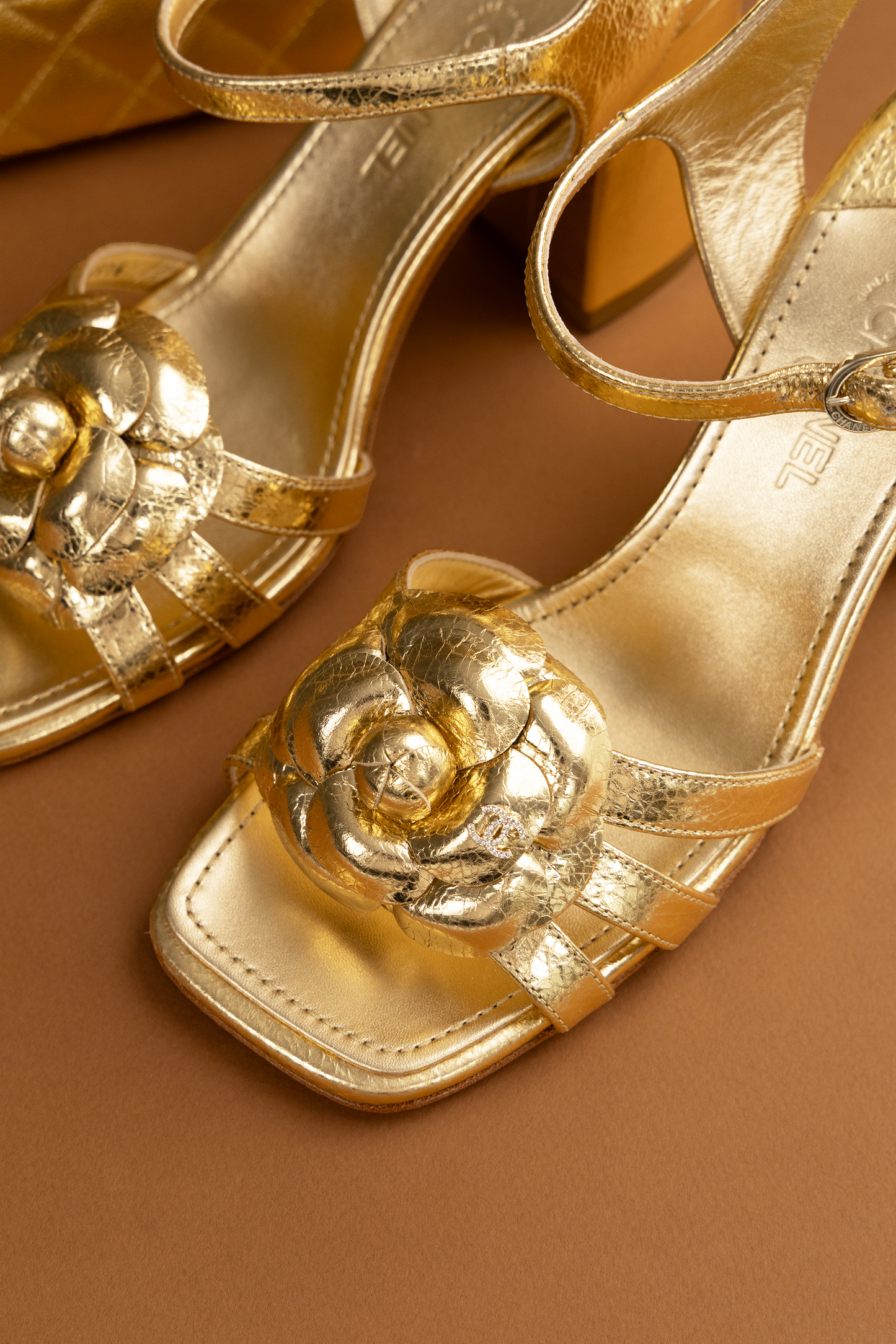 Chanel Vanity Case with Chain & Camellia Sandals in Metallic Gold