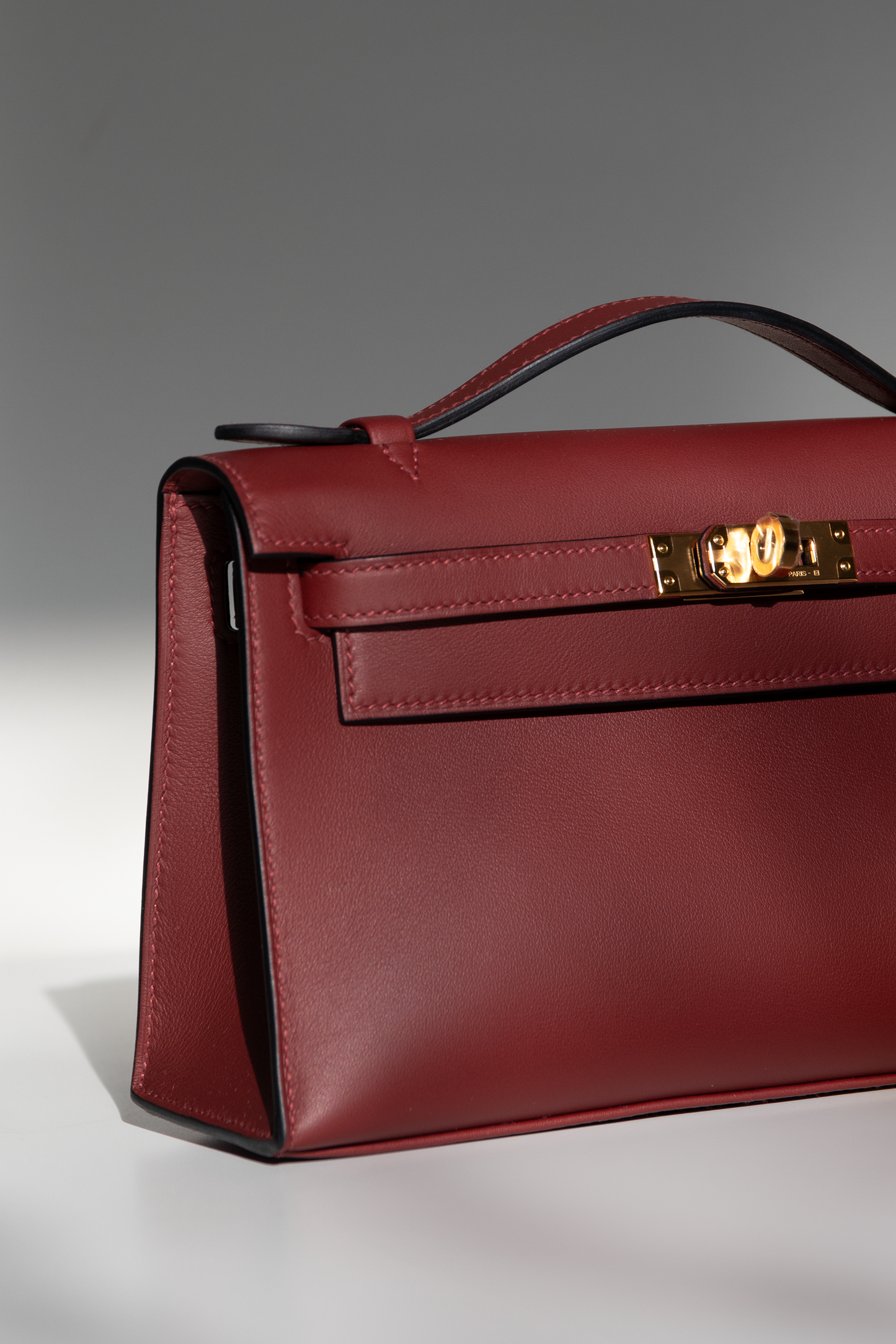Hermès Kelly Pochette Swift in Rouge H GHW