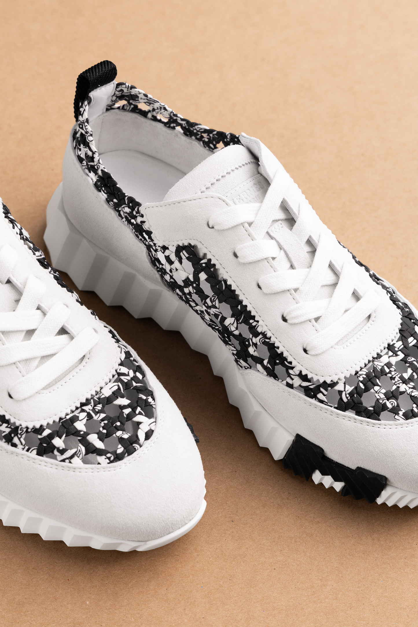 Hermès Braided Silk Suede Bouncing Sneakers in White/Black