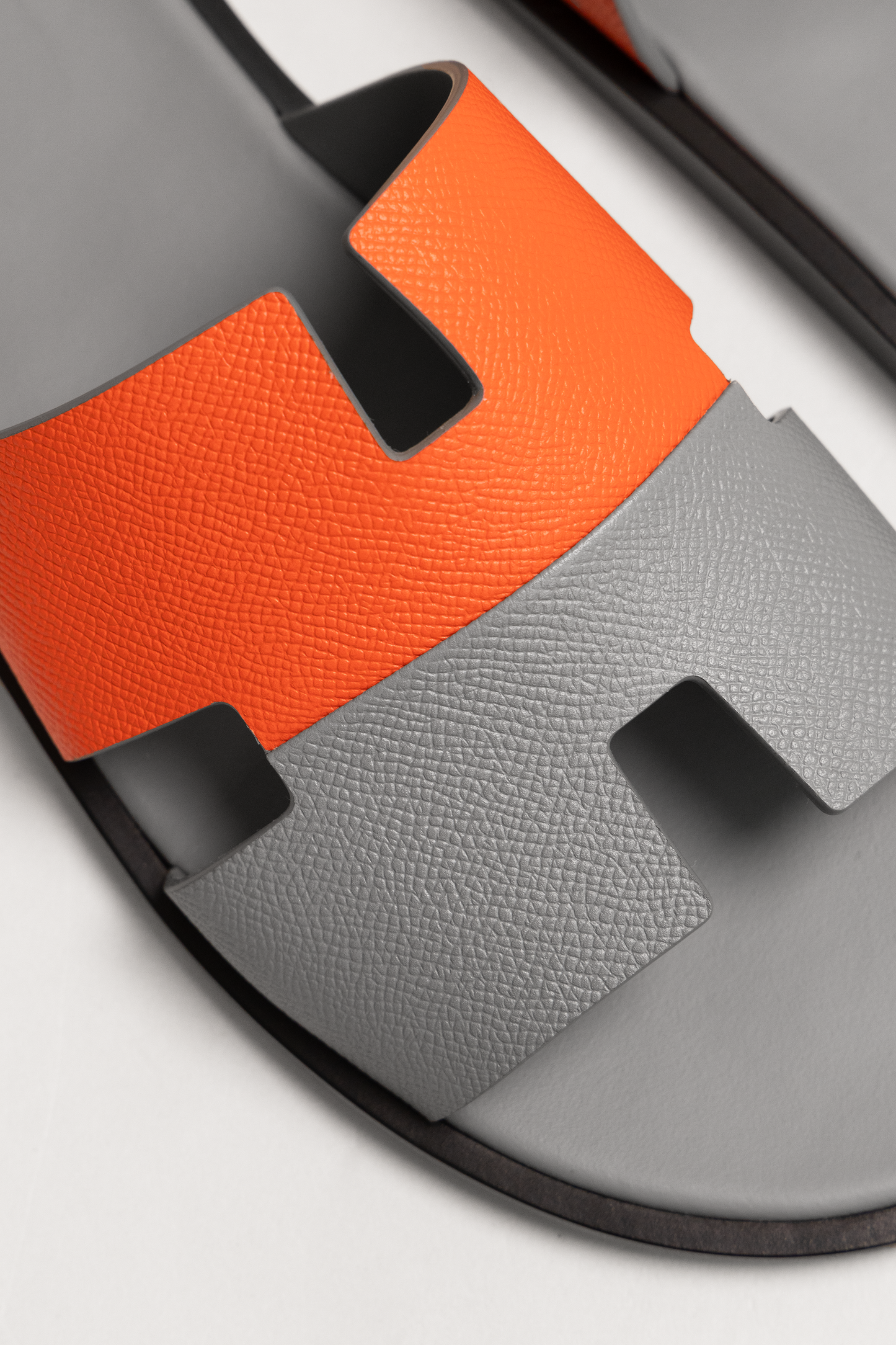Hermès Izmir Sandals in Orange/Gray