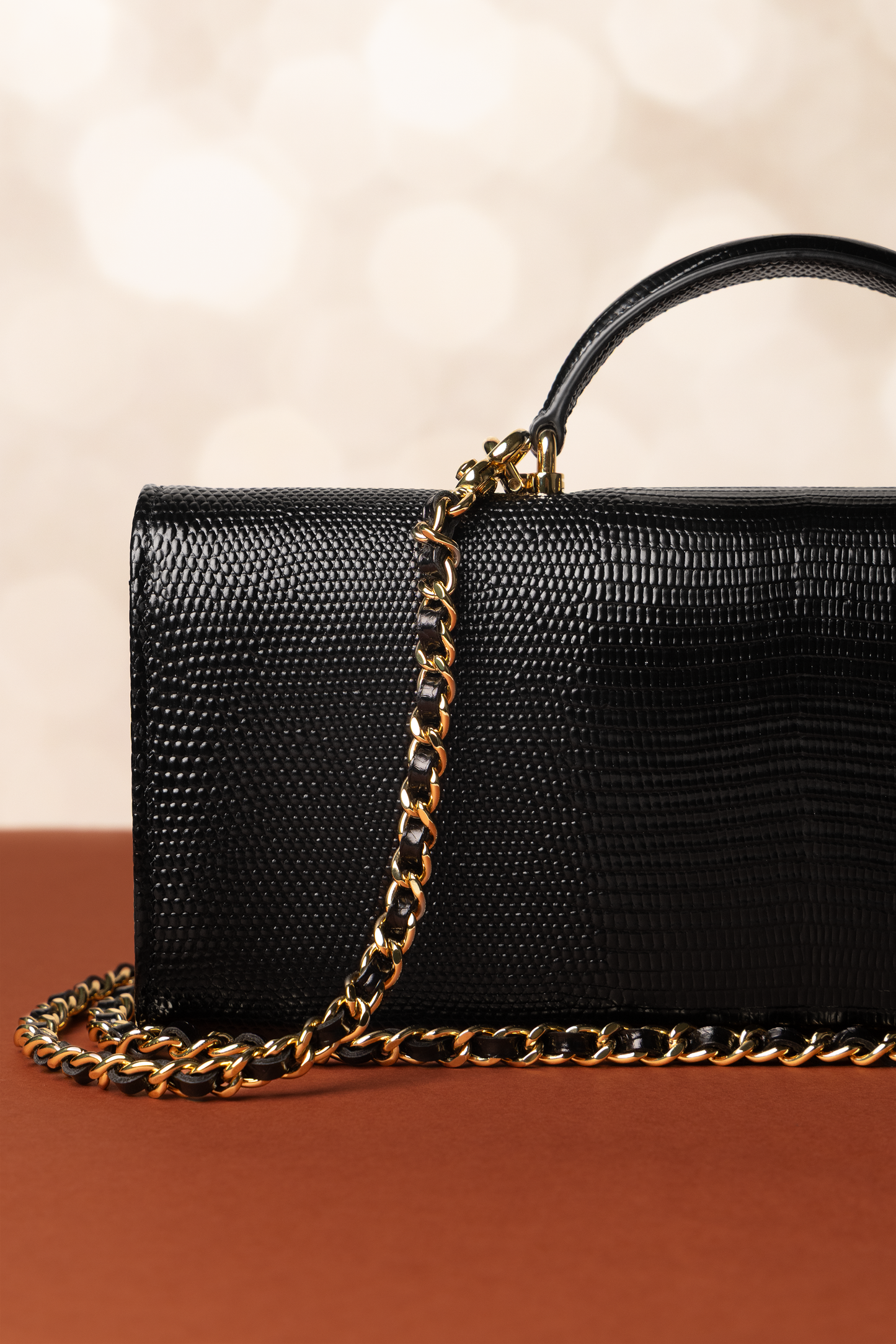 Chanel Clutch with Top Handle & Chain in Black Lizard