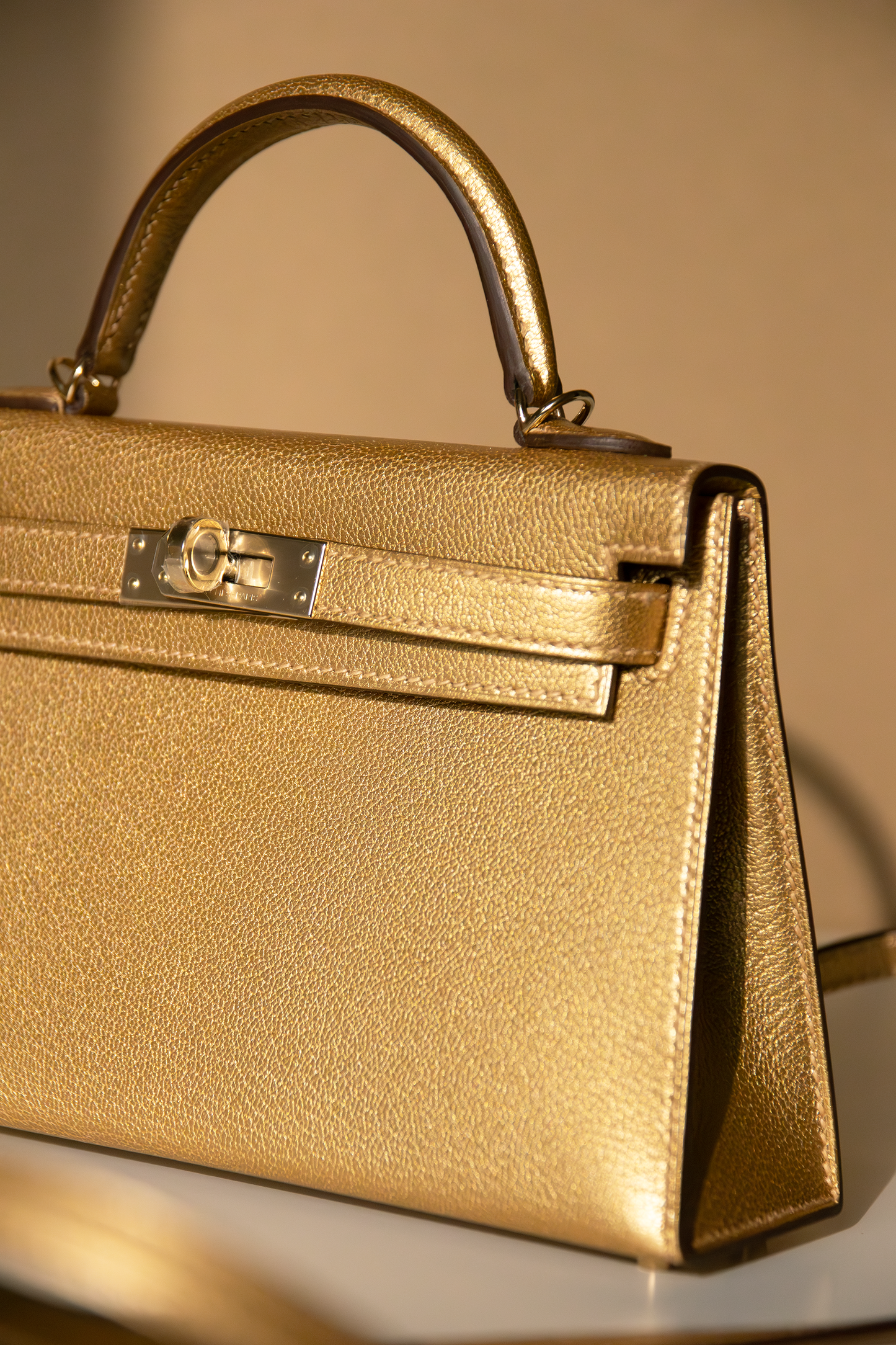 Hermès Mini Kelly Chevre Chamkilight Dore GHW