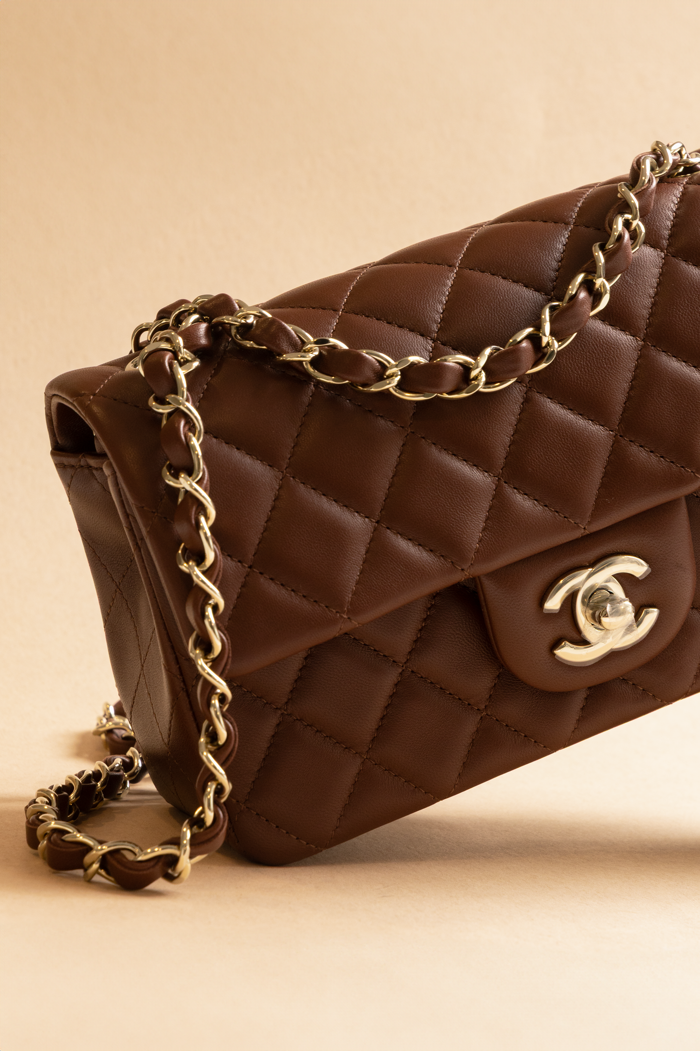 Chanel Mini Quilted Lambskin Flap Bag in Brown