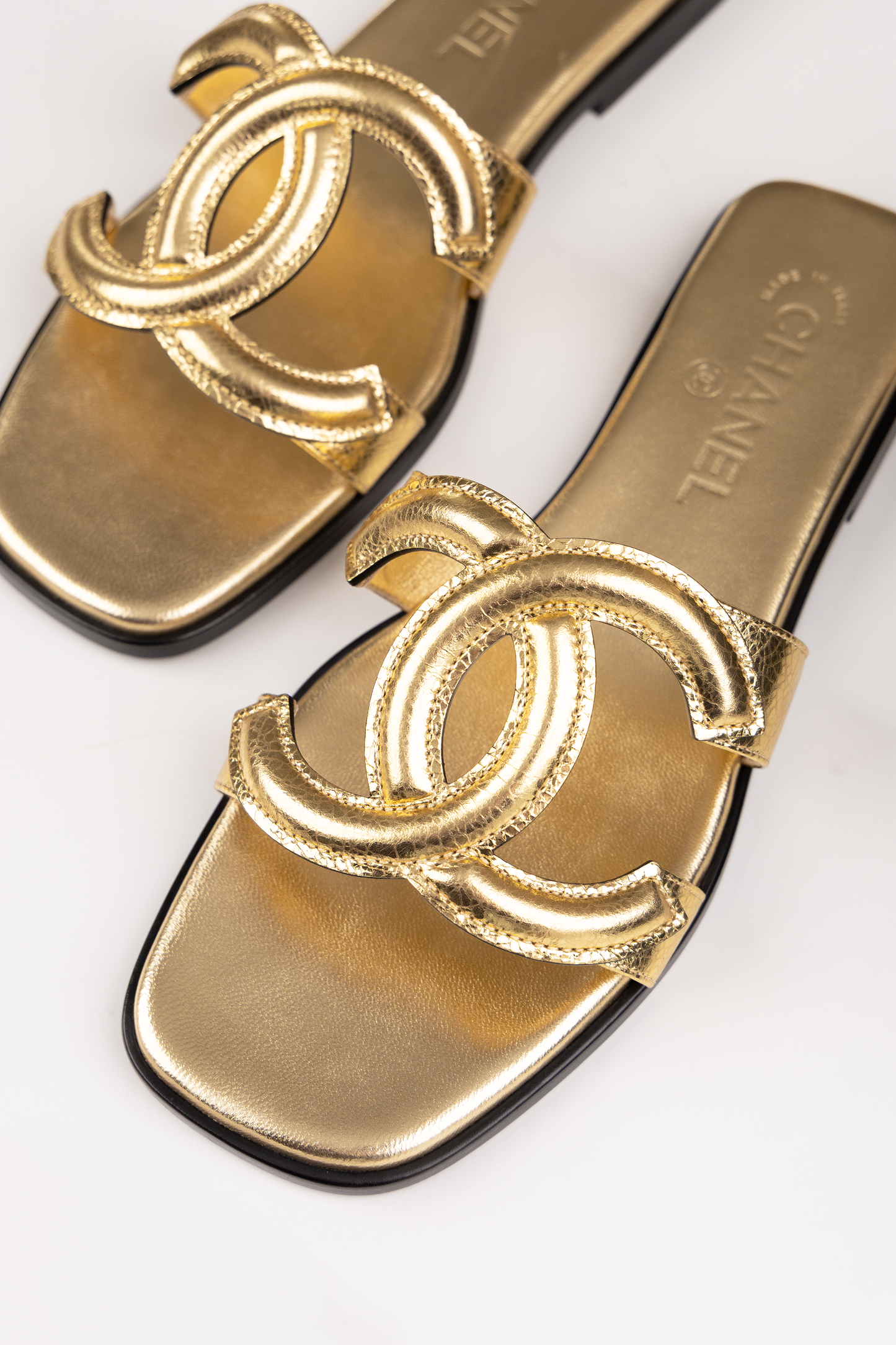 Chanel CC Metallic Gold Slides