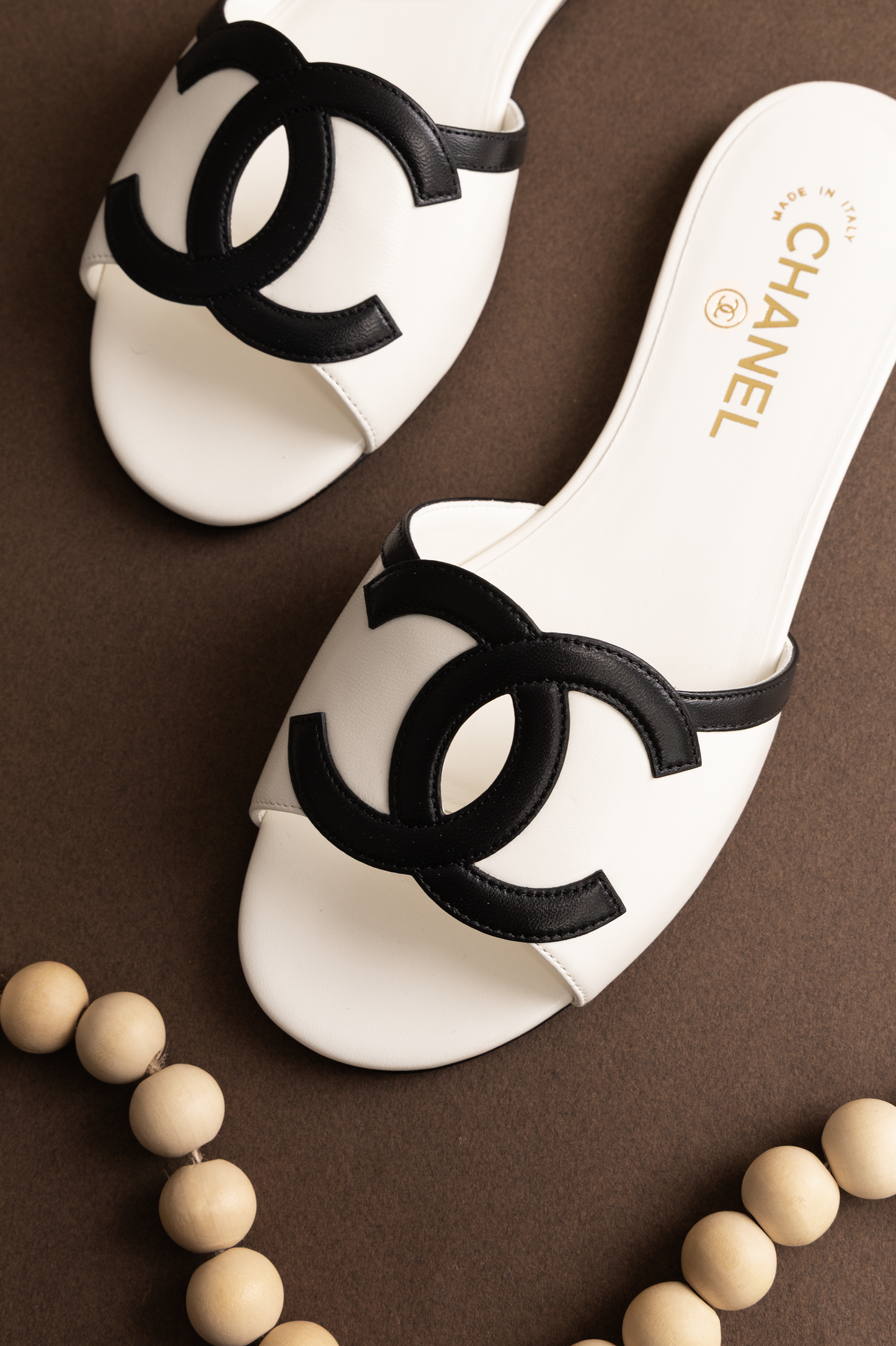 Chanel CC Mules in White/Black