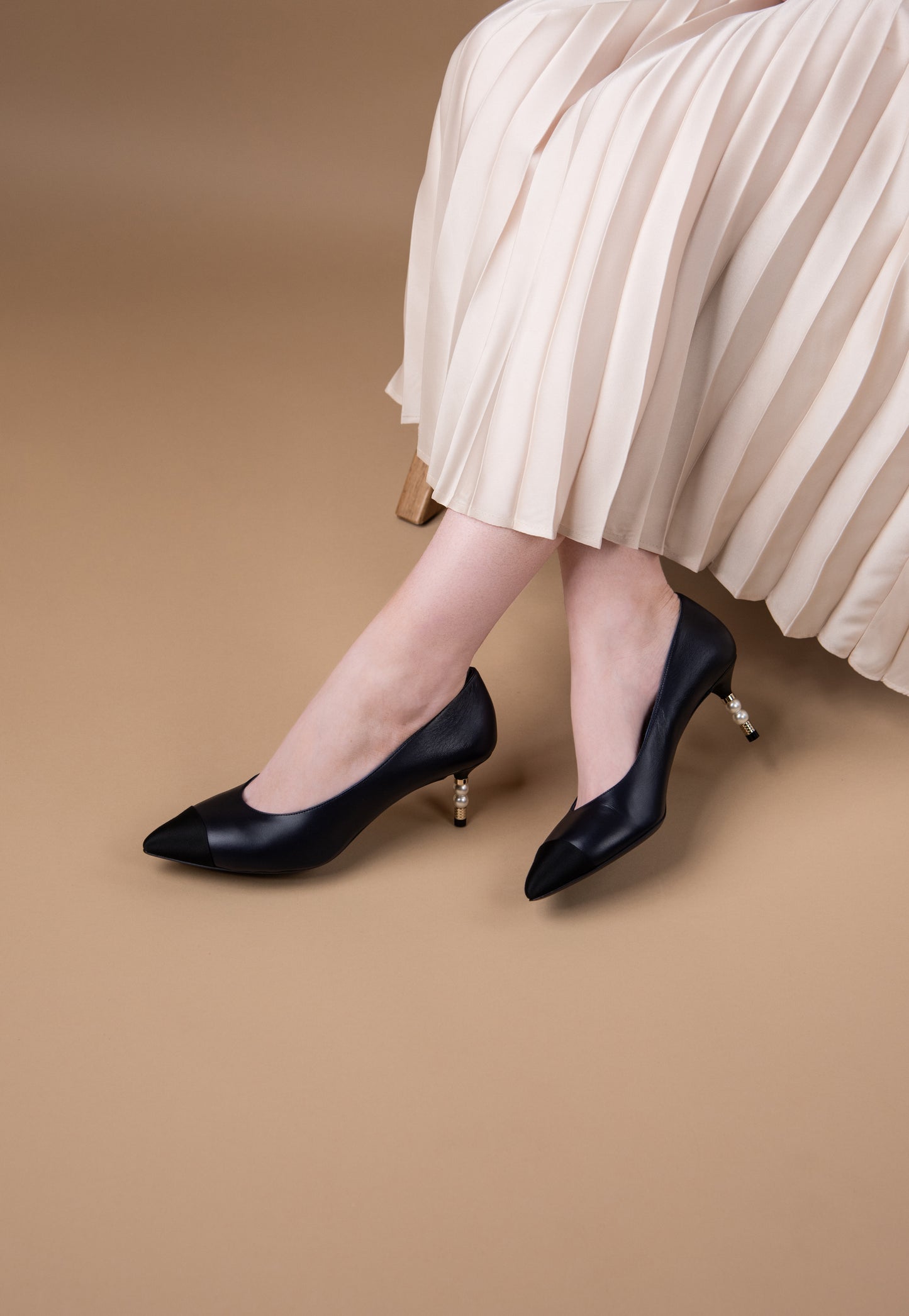 Chanel Navy Two Pearl Pumps