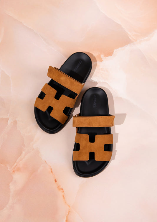Hermès Chypre Suede Sandals in Gold