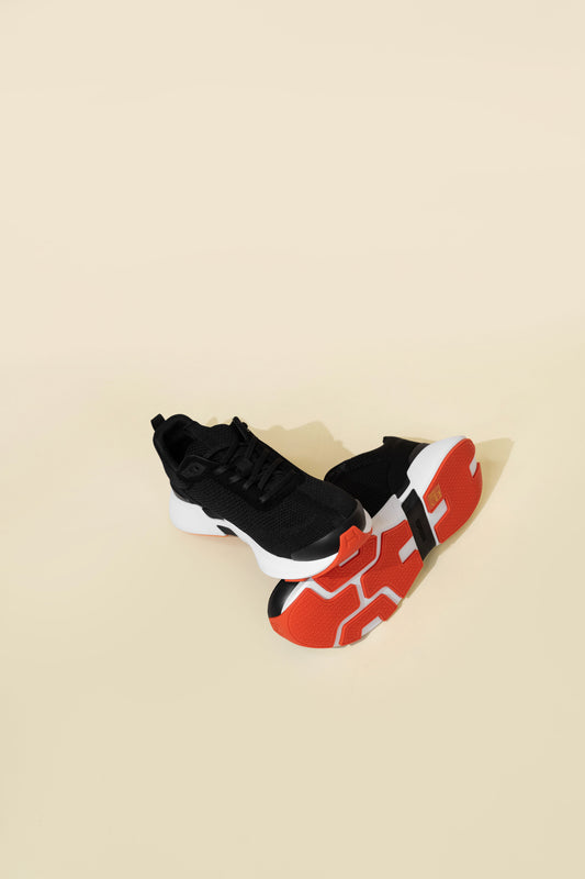 Hermès Heros Sneakers in Black/White/Orange