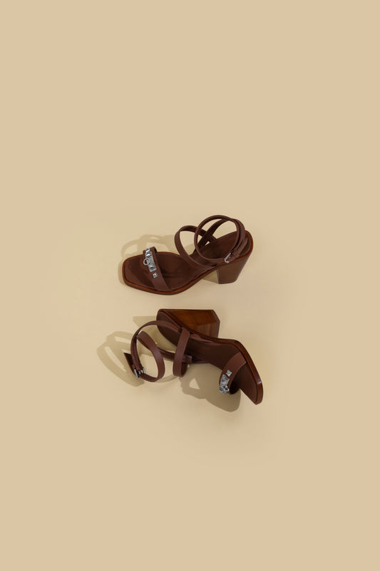 Hermès Ivresse 65 Sandals in Gold