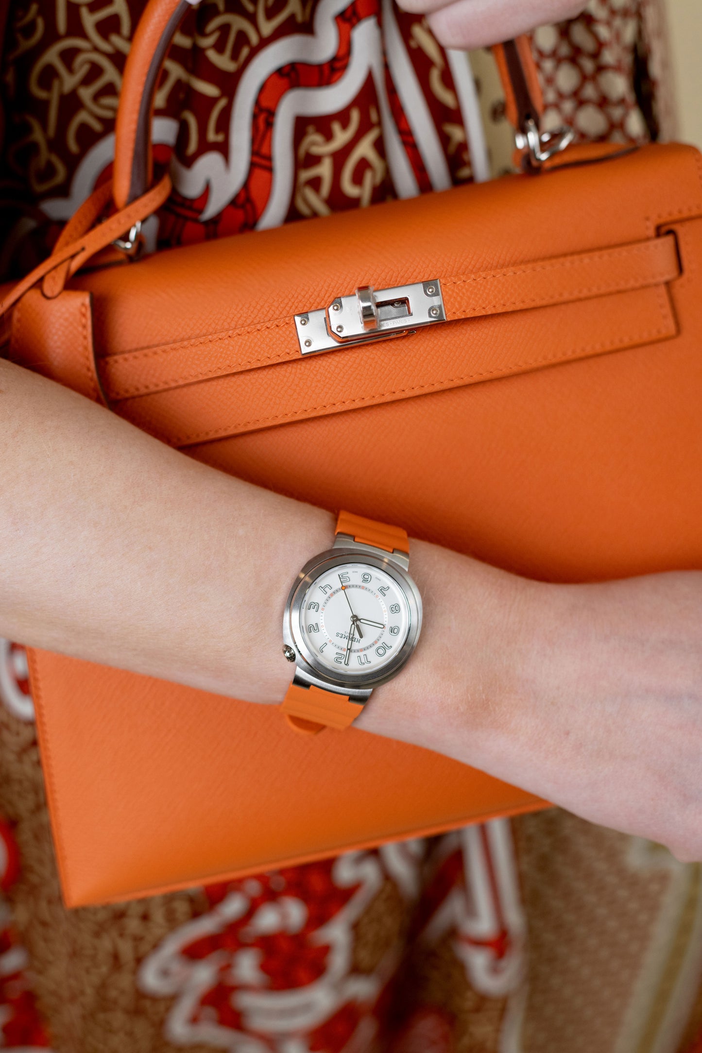 Hermès Kelly 25 Epsom Orange PHW & Hermès Cut Watch with Orange Strap