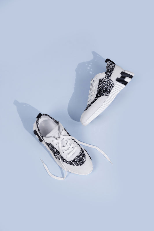 Hermès Bouncing Sneakers in Noir/Blanc