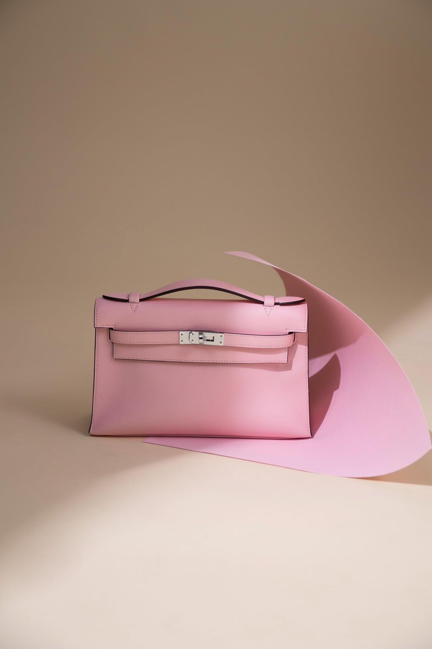 Hermès Kelly Pochette Swift in Sakura PHW
