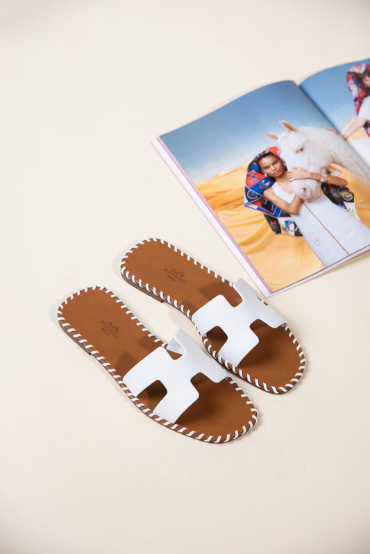 Hermès Limited Edition White Leather Oran Flat Sandals