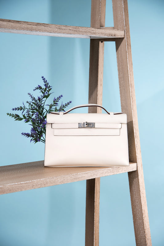 Hermès Kelly Pochette Swift in Nata PHW
