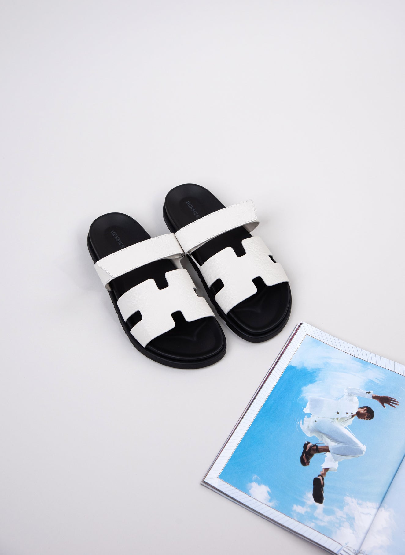 Hermès - Chypre Sandals in White/Black