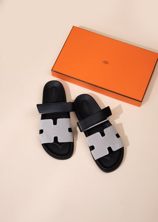 Hermès Chypre Sandals in Black/Canvas