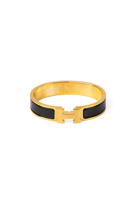Hermes Clic H Bracelet in Black/Yellow Gold