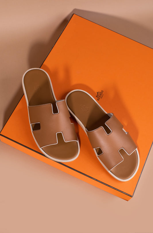 Hermès - Izmir Sandals in Gold