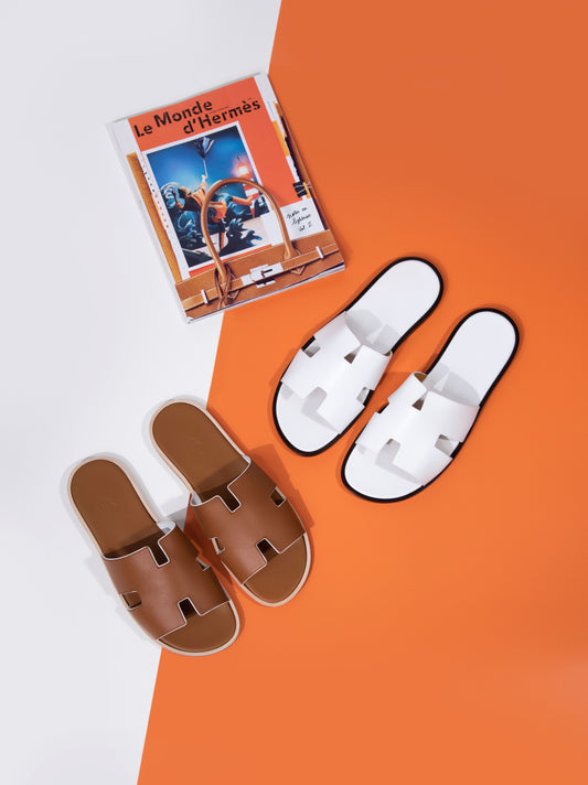 Hermès - Izmir Sandals in Gold & White